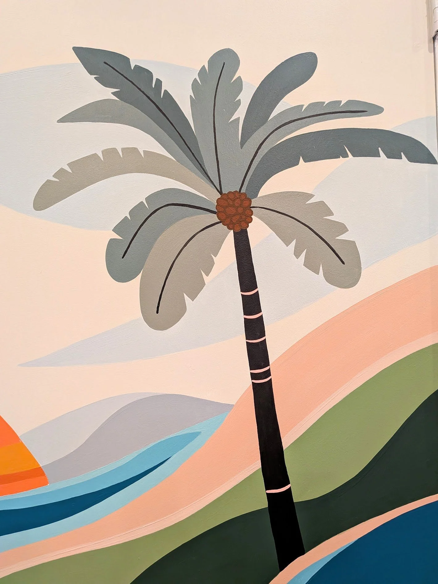 San Antonio apartment community fitness center mural featuring a tropical landscape, cyclist, yoga figure, and palm trees.