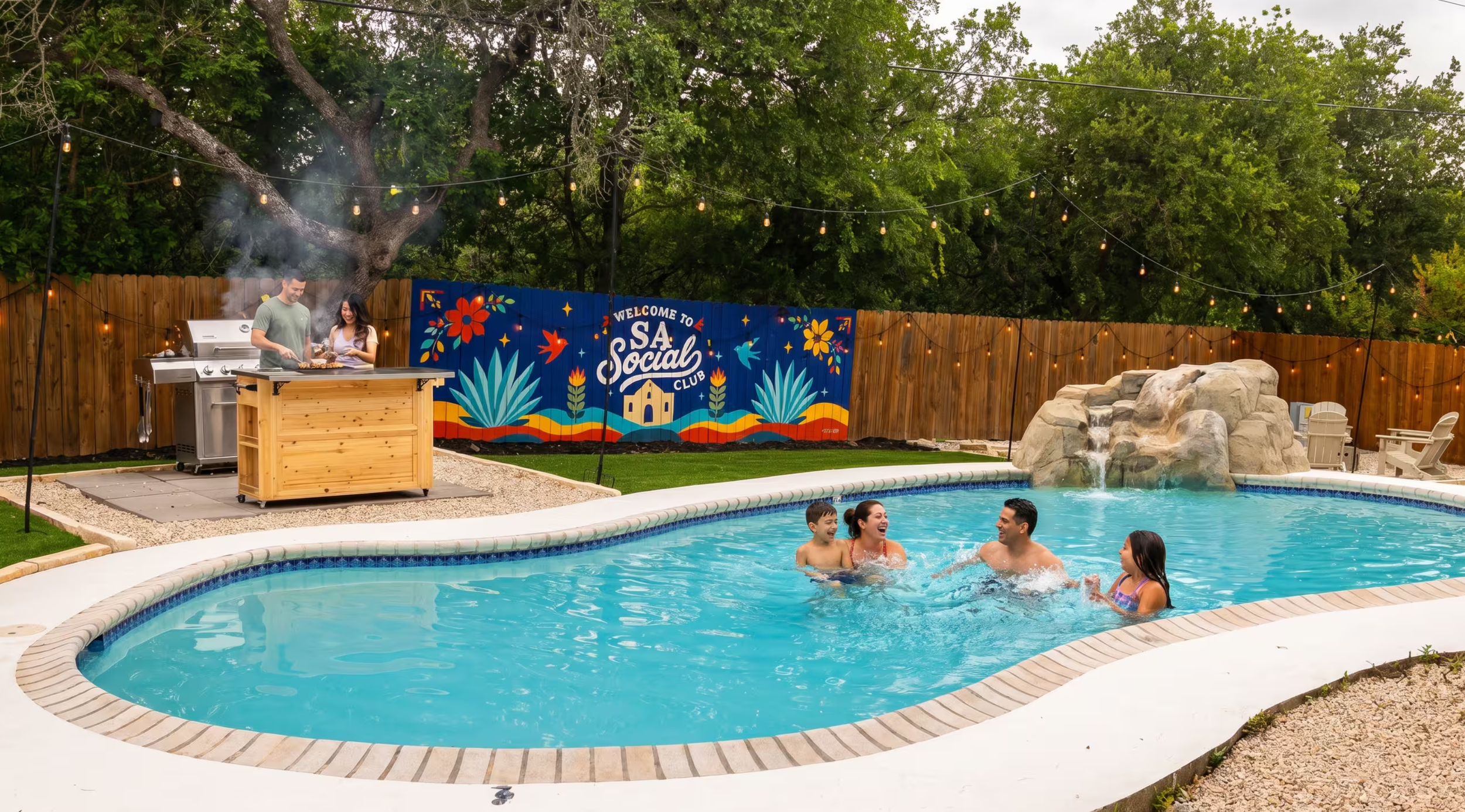 San Antonio short-term rental with a colorful exterior fence mural overlooking the backyard pool and outdoor living area.