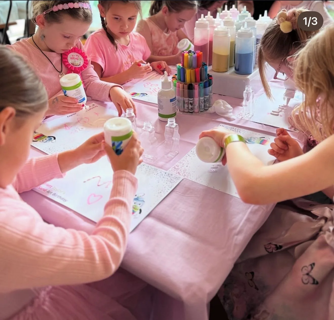 children enjoying kids soiree sand art party