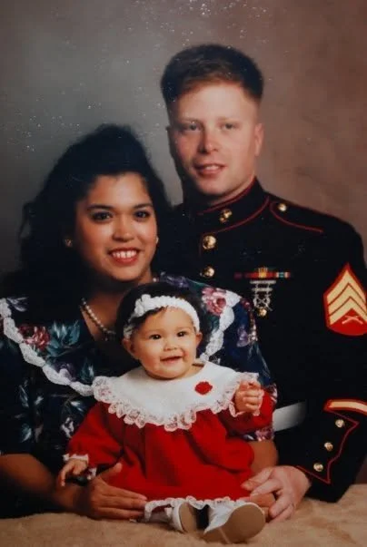 A family portrait from Sarge's Pupdos with a man in military uniform. Sarge's Pupdos honors military members past and present 