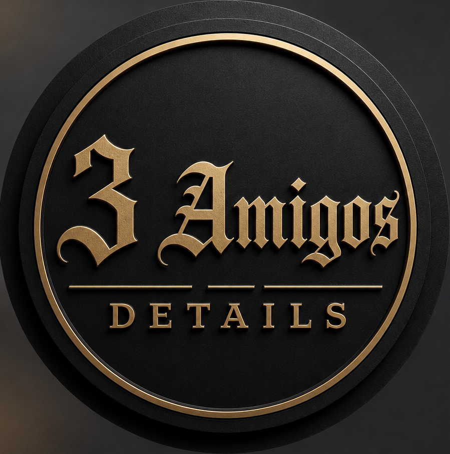 Round black and gold sign reading '3 Amigos DETAILS' with decorative gold border.