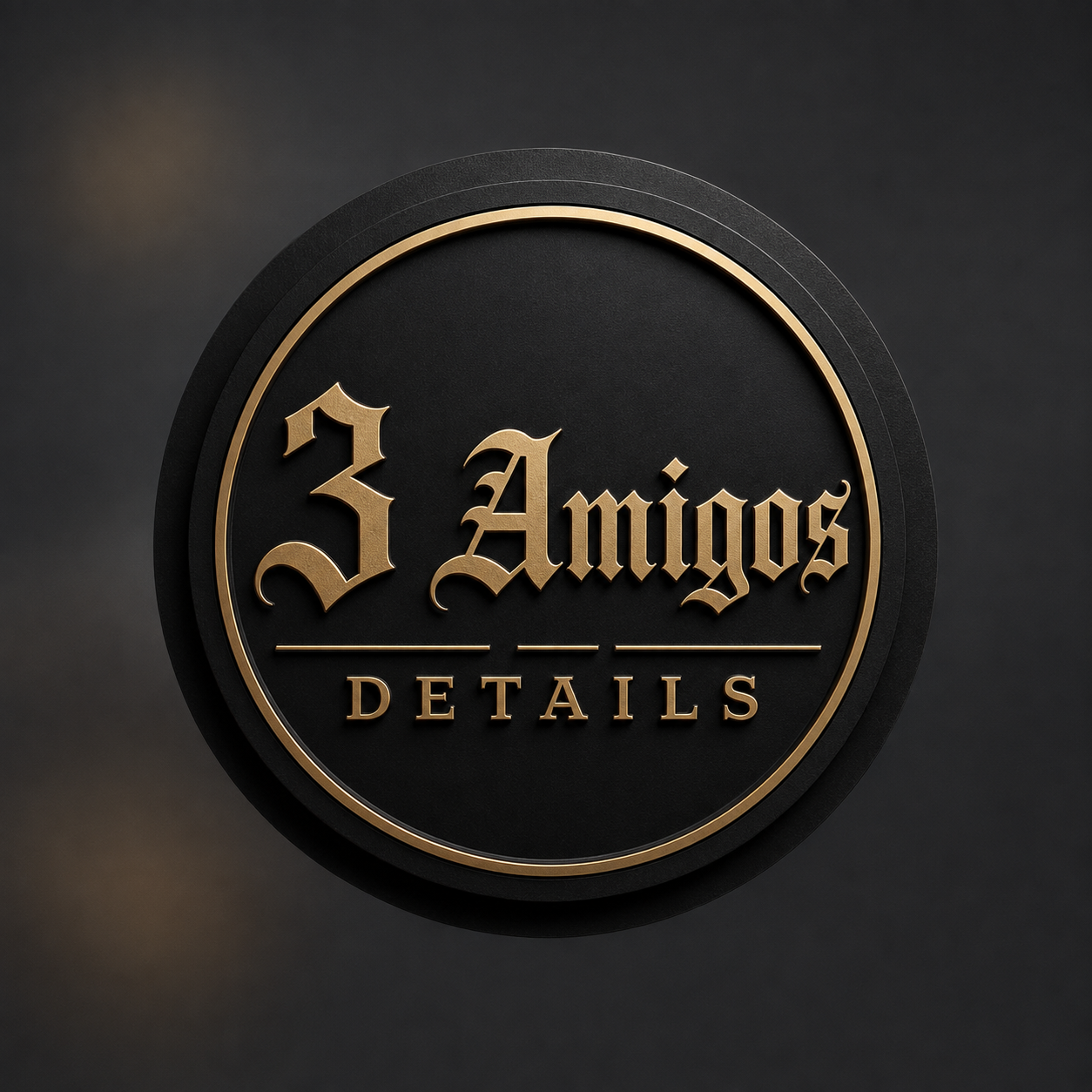 A circular black badge with gold text reading '3 Amigos' in a Gothic font and 'DETAILS' in a smaller, uppercase font underneath.