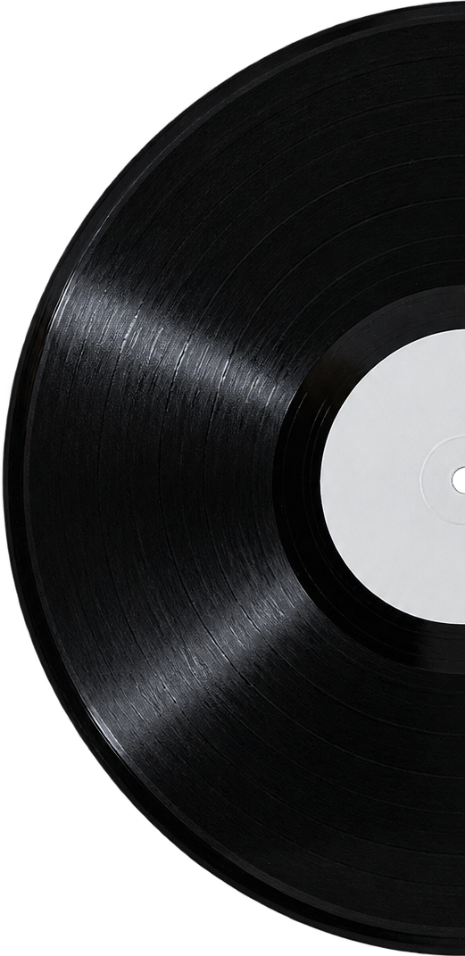 Close-up of a black vinyl record with a white label in the center, against a black background.