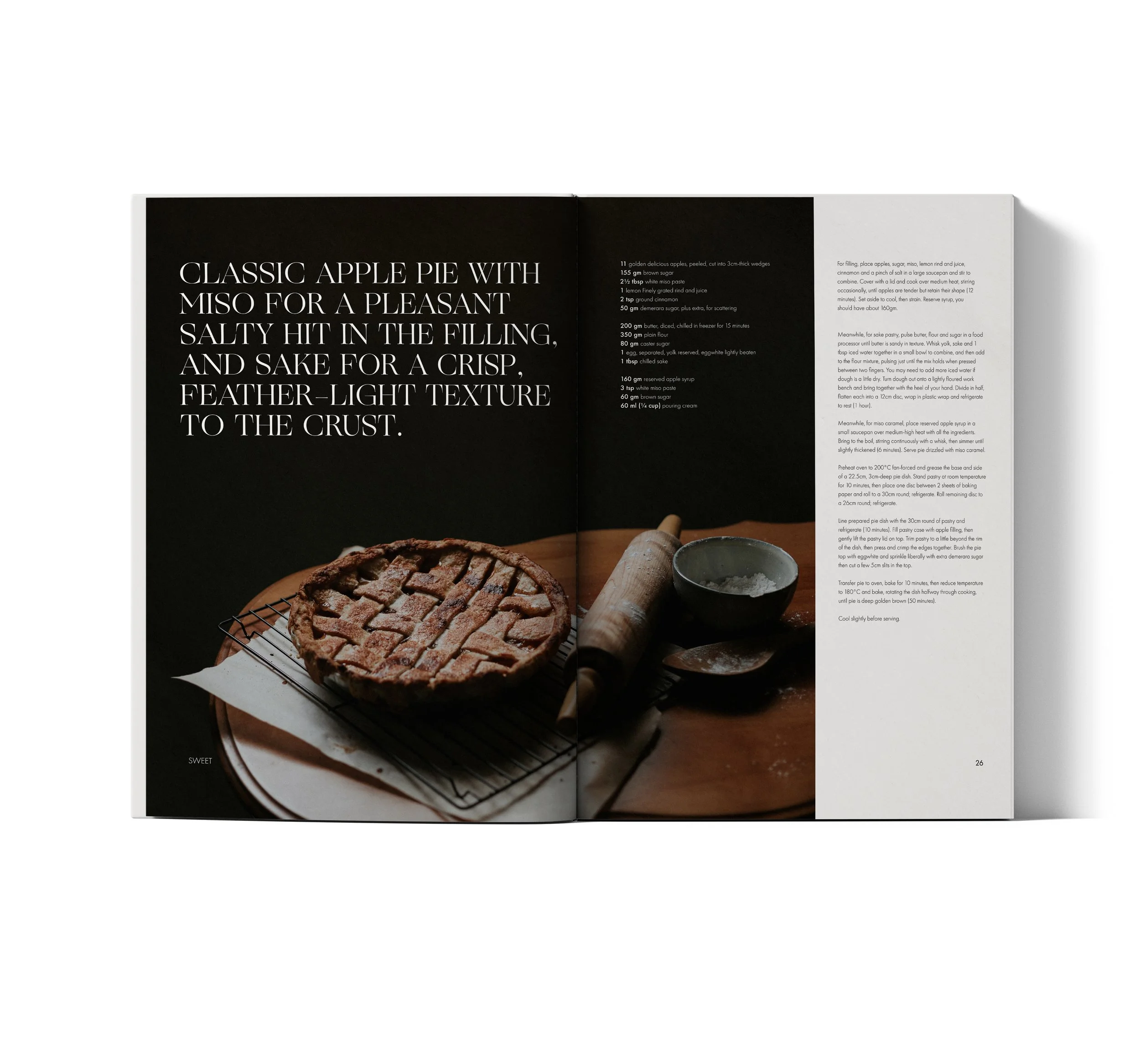 Open magazine spread featuring a large image of a baked apple pie with a lattice crust cooling on a wire rack, and adjoining pages with recipe text.