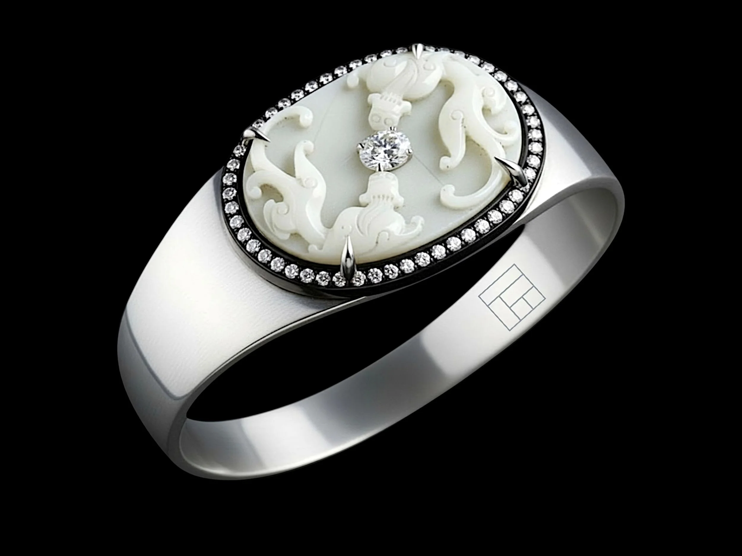 Close-up of a ring featuring a black band, a central diamond, and a white, ornate inlay with floral and scroll design, surrounded by small diamonds.