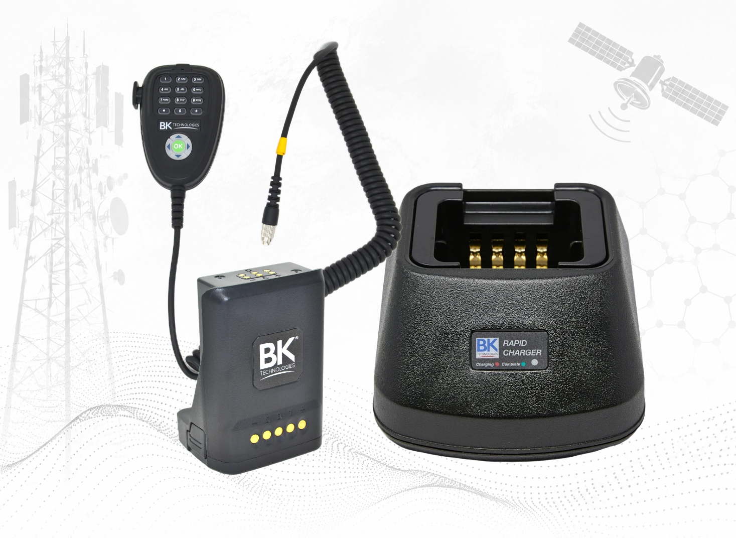 Radio communication device with a handheld remote, a battery pack, a rapid charger, and a coiled cable.