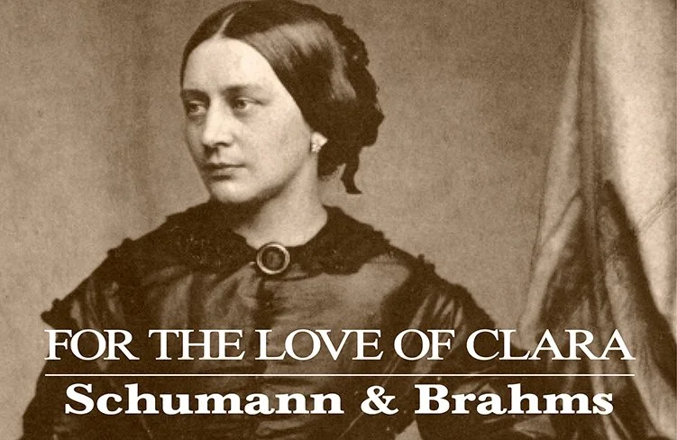 A sepia-toned portrait of a woman with dark hair styled in a bun, wearing a dark dress with lace details, and a brooch at her collar. The text reads "For the Love of Clara Schumann & Brahms".