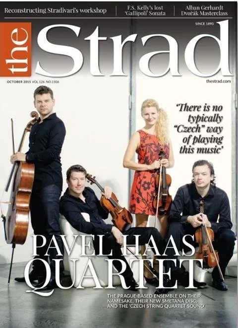 Cover of 'The Strad' magazine featuring the Pavel Haas Quartet with four members holding string instruments, one standing with a cello, two seated with violins, and one standing with a viola, against a light background.