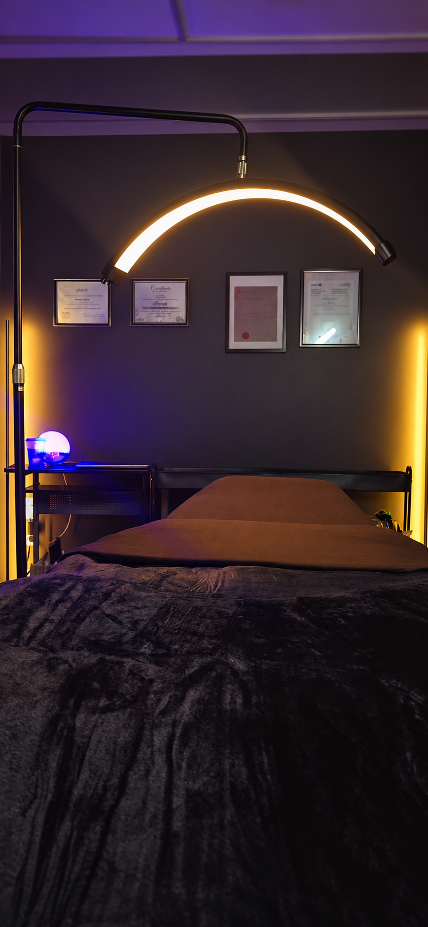 Skintentional Aesthetics clinic treatment room with warm lighting