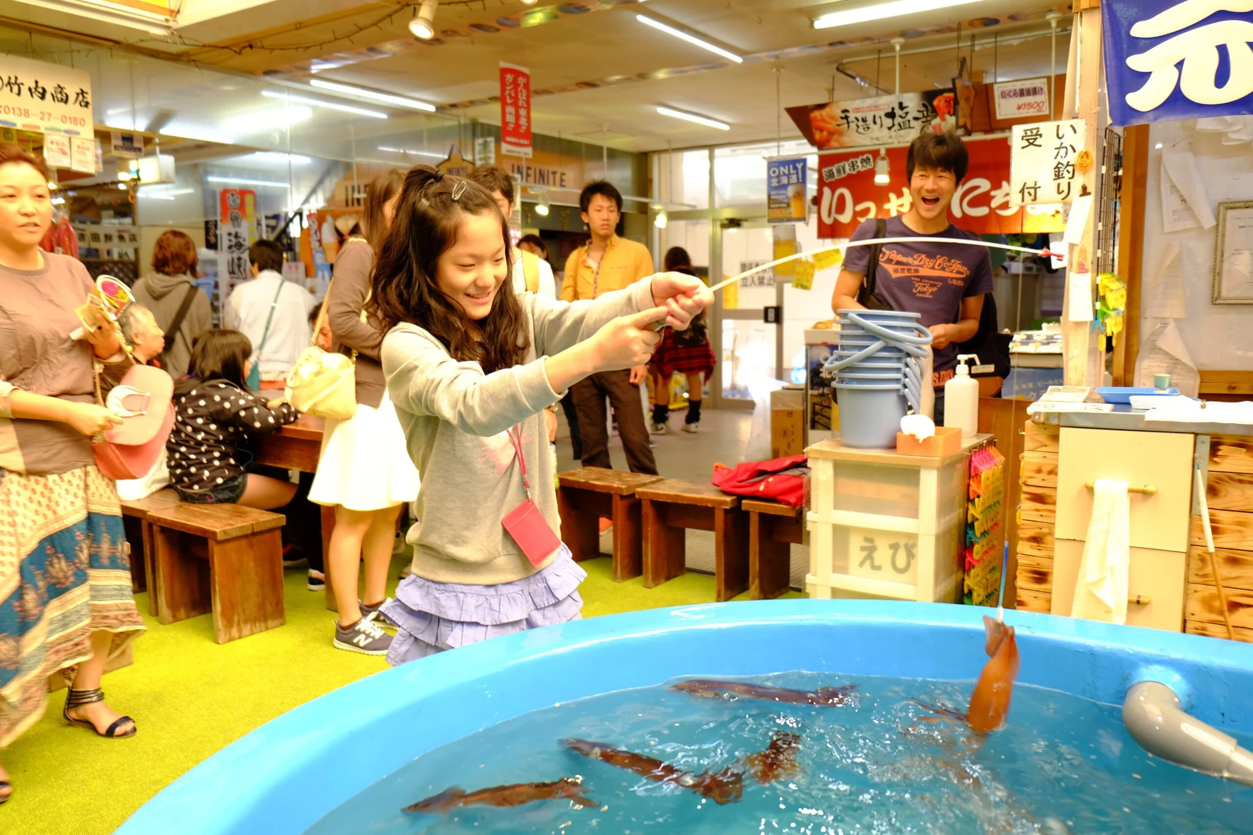 Fishing for squid in the Morning Market.