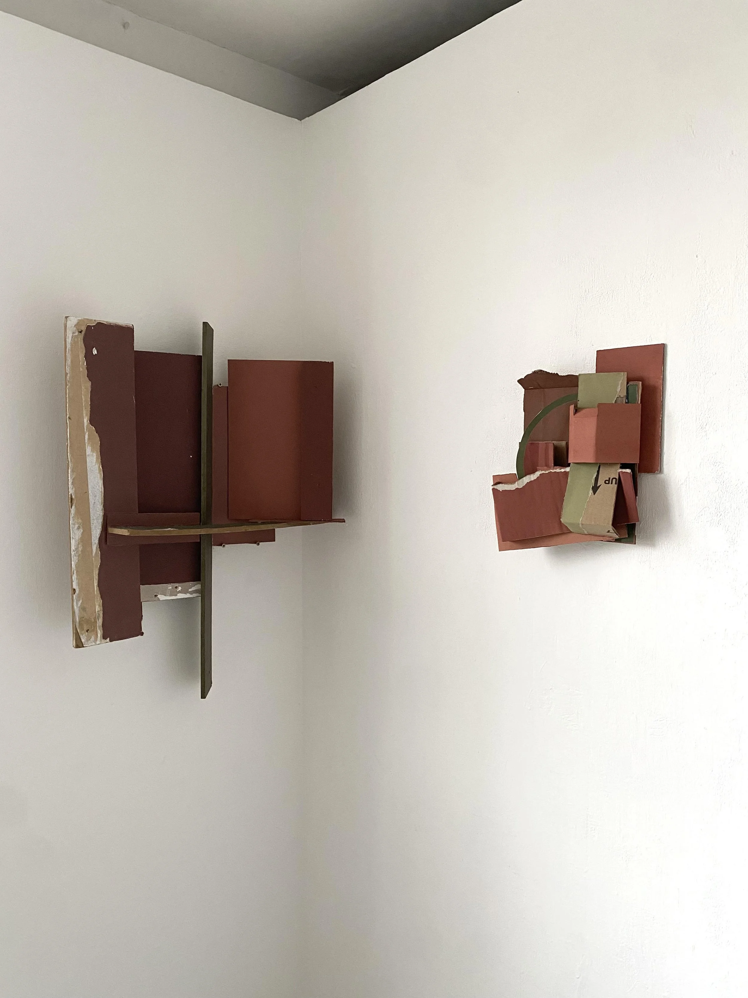 Corner constructions, emulsion/household paint on found boards/wood, January 2025, 57 x 80 x 8 cm (left)