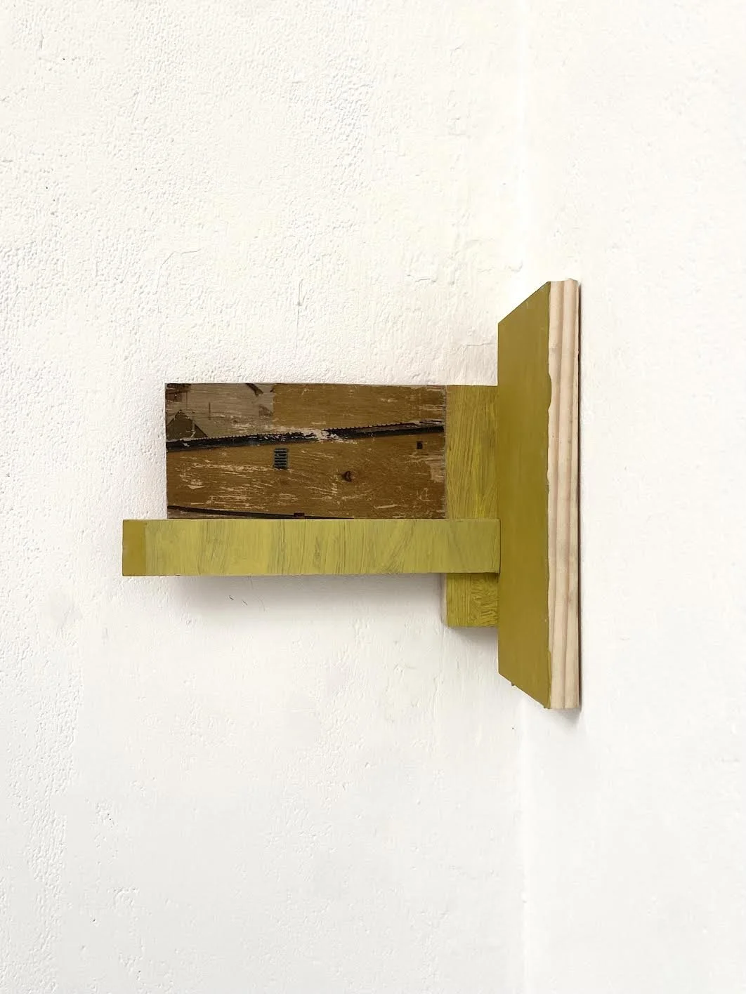 Clamp, painted wood, painted paper and image transfer construction, 24 x 27 x 4 cm, February 2026