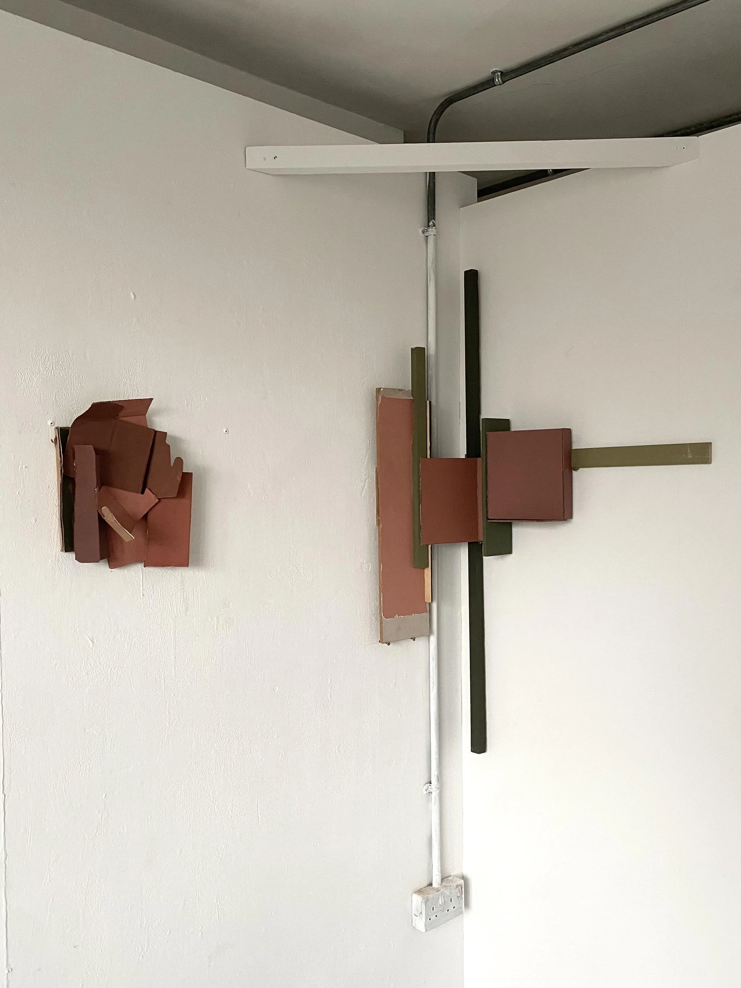 Corner constructions, emulsion/household paint on found boards/wood, January 2025, 74 x 120 x 15 cm (right)