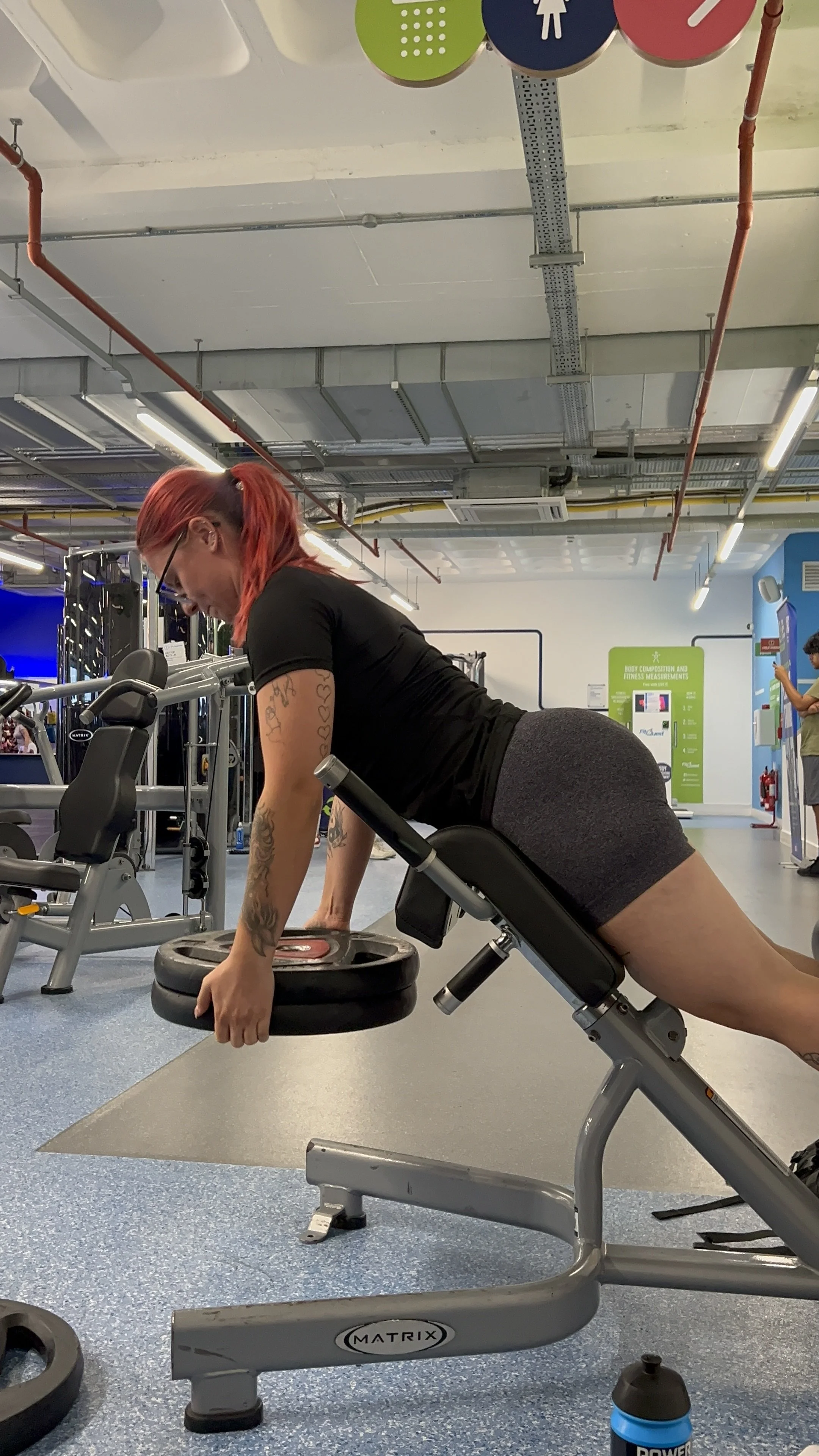Woman doing hyperextensions