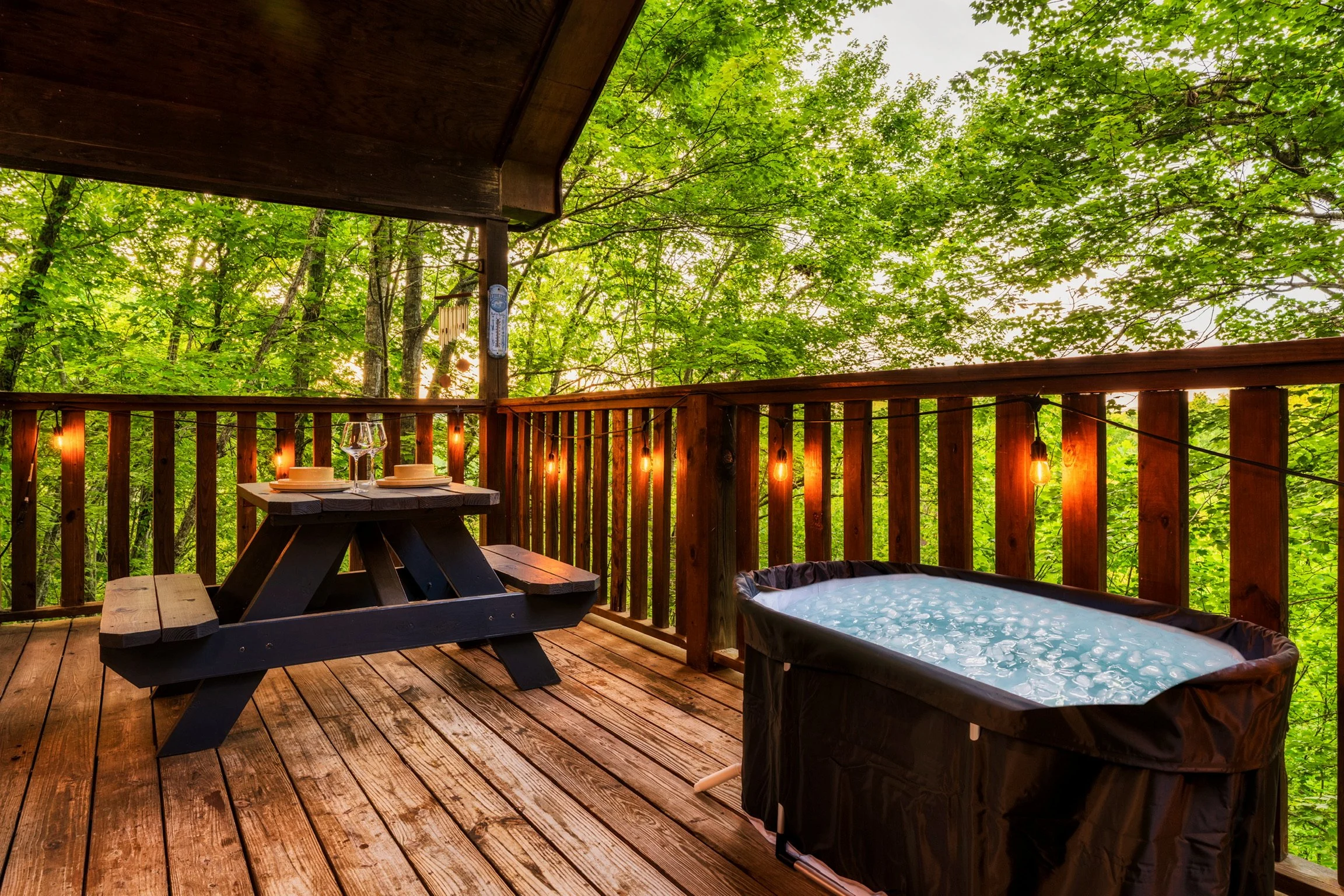 Blue Sage Hideaway upper level balcony deck table and optional upgrade cold plunge, wide angle 