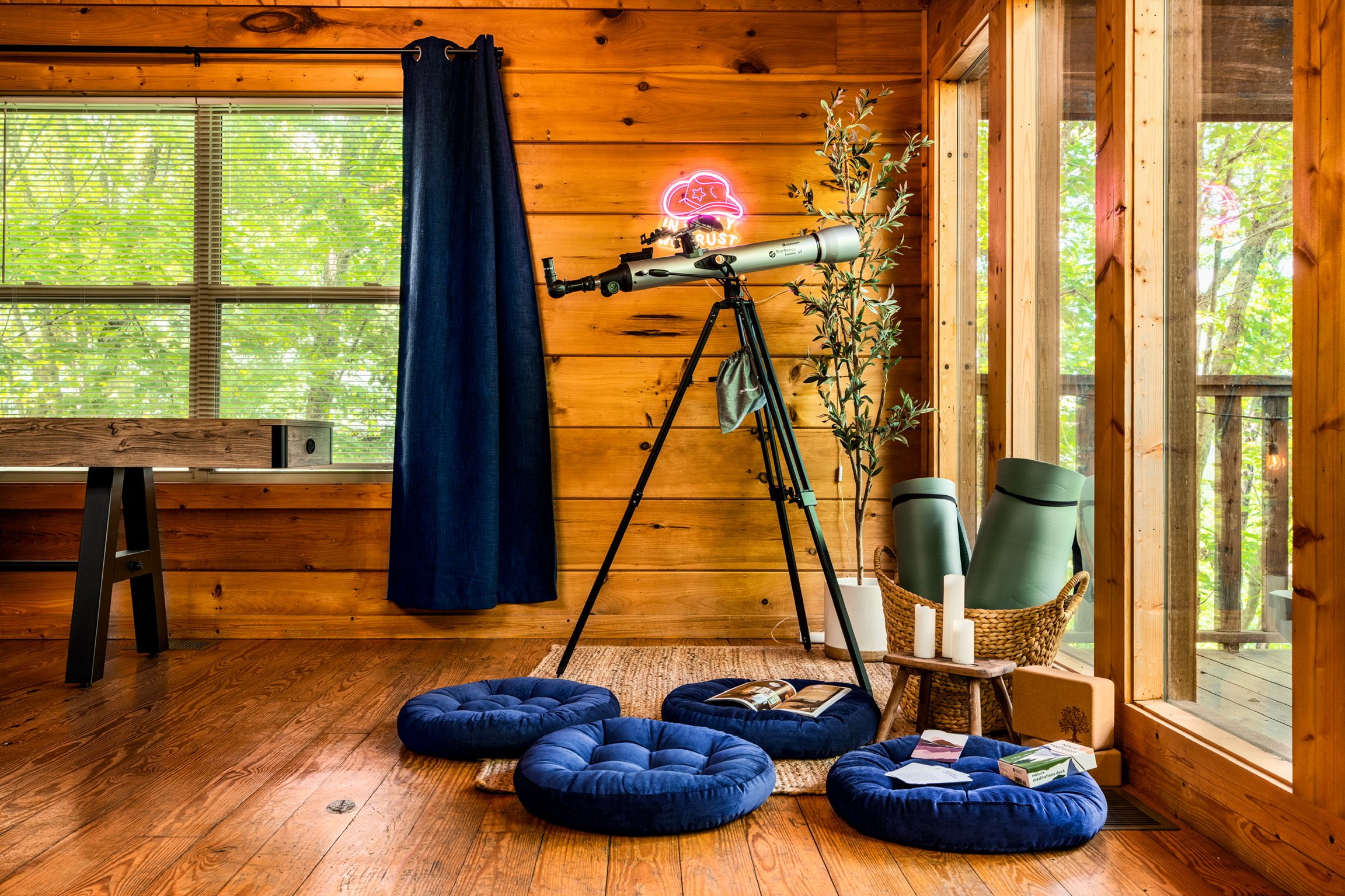 Blue Sage Hideaway telescope by window, close view 