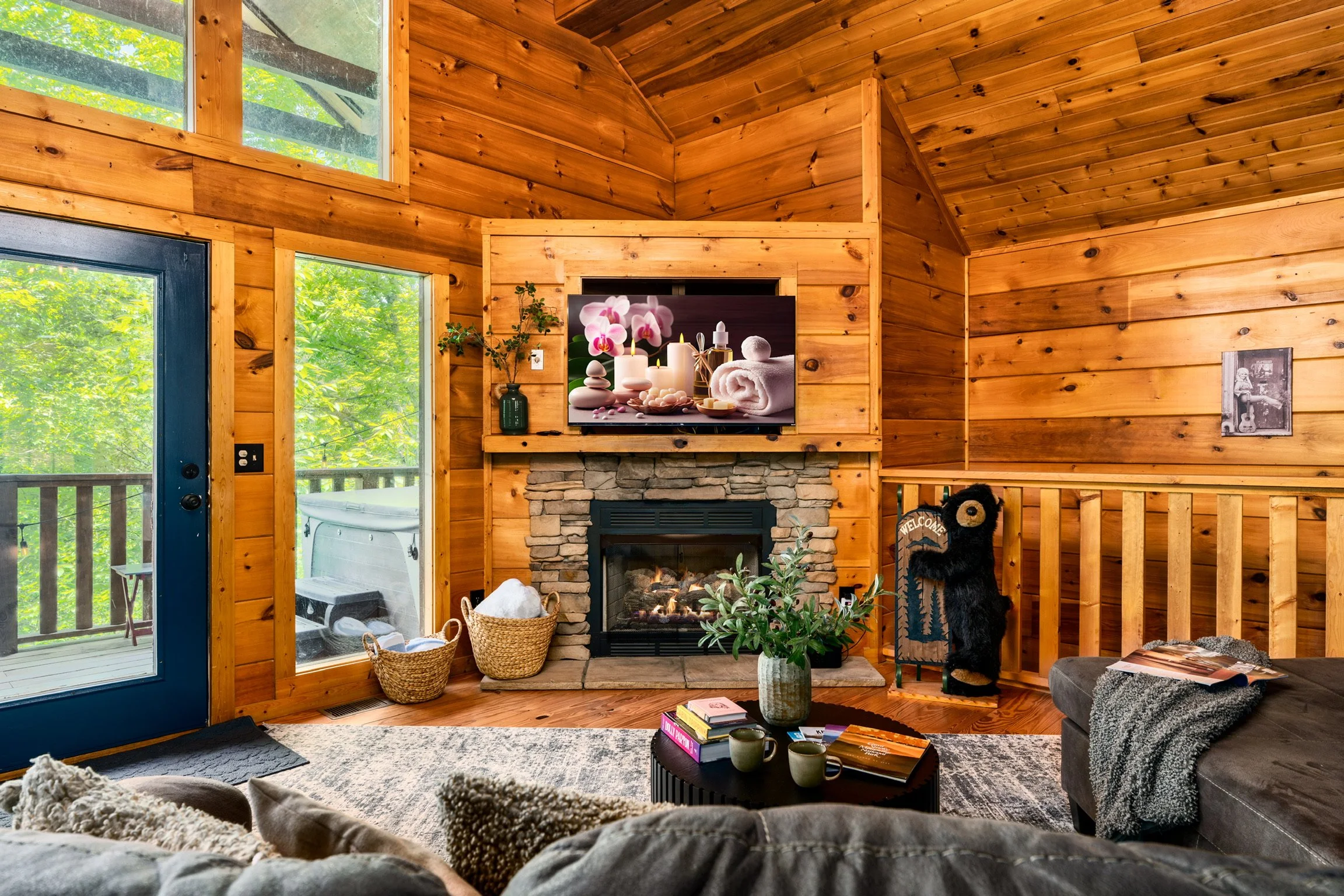 Blue Sage Hideaway leather sectional with stone fireplace, close view 