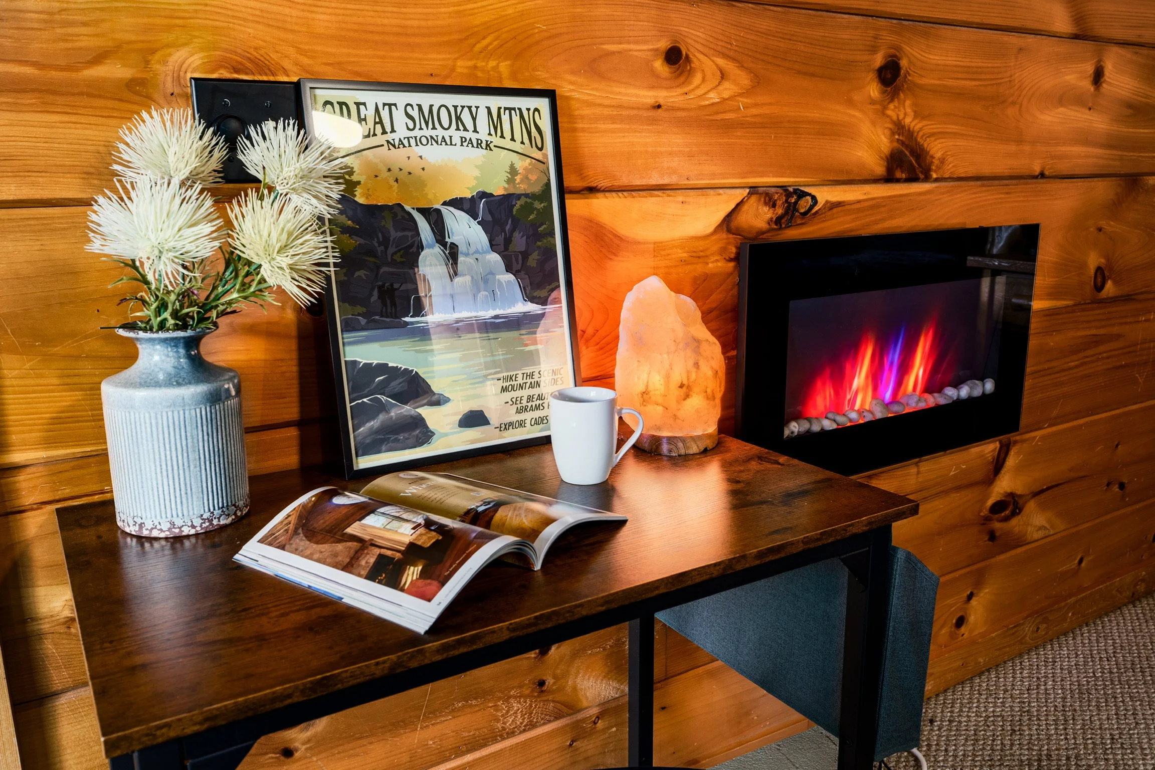  Blue Sage Hideaway bedroom desk with electric fireplace and TV