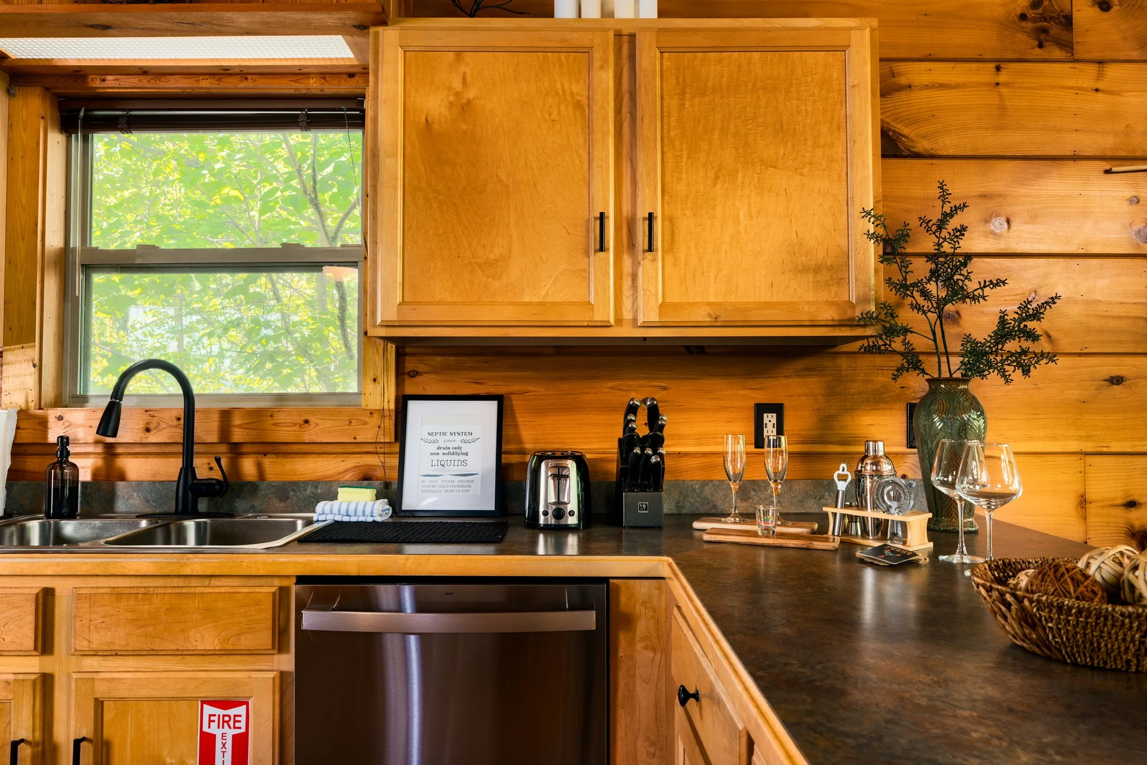 Blue Sage Hideaway kitchen counter with dishwasher 