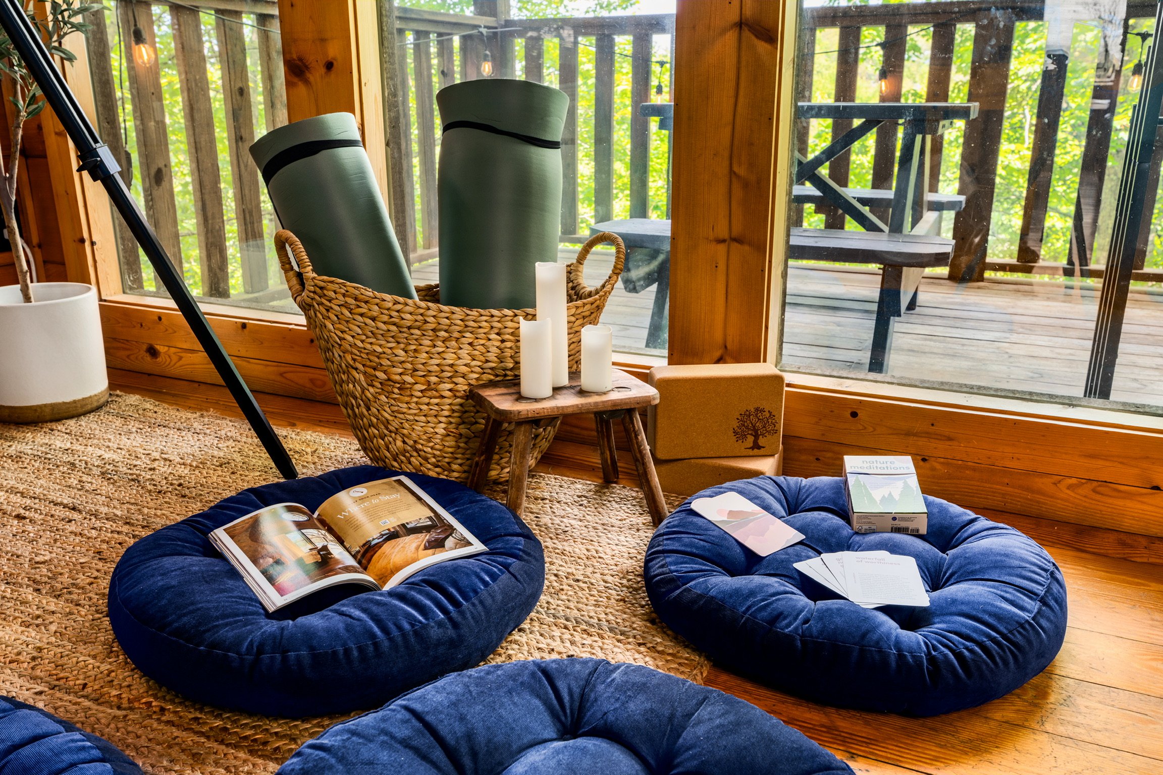 Blue Sage Hideaway yoga mats and mediation cards by window
