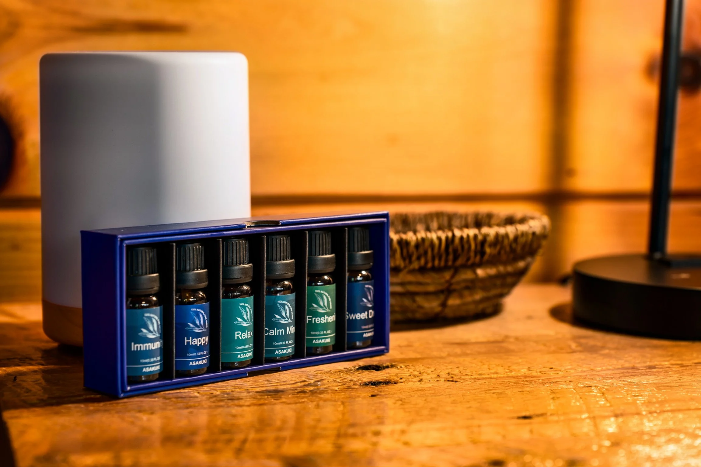 Blue Sage Hideaway essential oils set on nightstand 