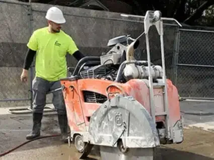 CIDS concrete cutting crew operating concrete sawing equipment