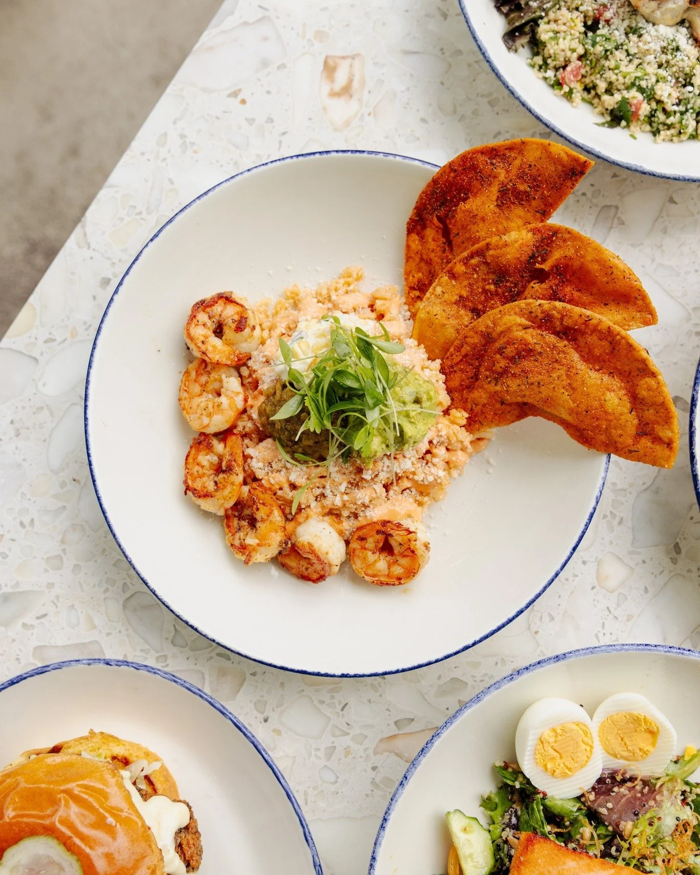 Lunch! Today from 11am to 3pm before rollin' right into happy hour.

Featured front and center is one of our favorite new bowls (they're all delicious! 🤤). 

🥑 Grilled Shrimp Bowl: Spanish Rice, Corn Salad, Salsa Verde, Cilantro, Guacamole, Tostada
