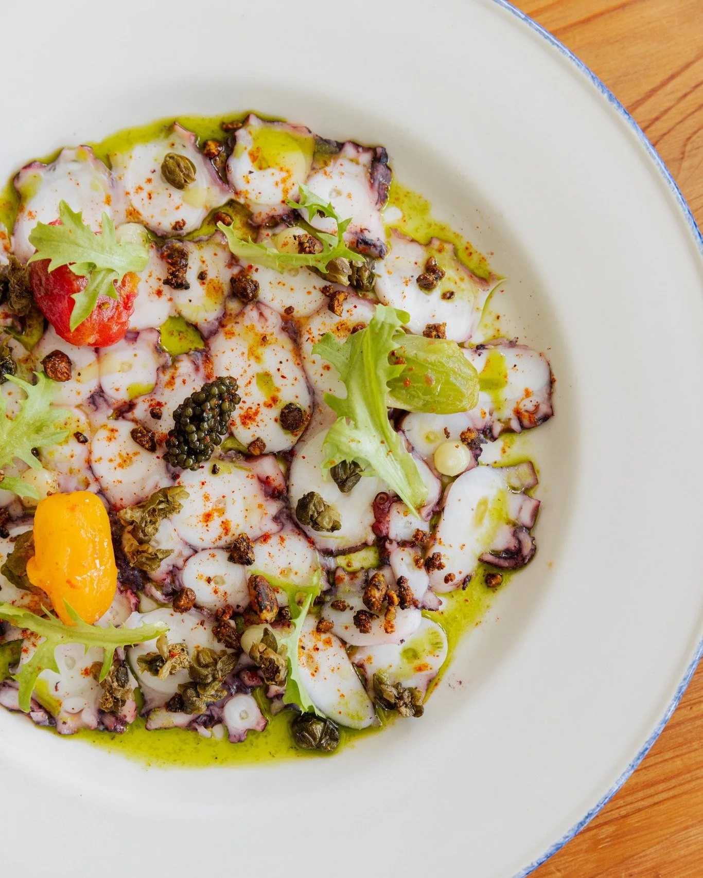 An exceptionally pretty dish 😍😍😍

Find our Spanish Octopus Carpaccio on the dinner menu, finished with Caper Vinaigrette, Tomato, Sorrel, Pistachio and Osetra Caviar (‼️). 

"But, how?" you ask. Well, let us tell you. It&rsquo;s a meticu