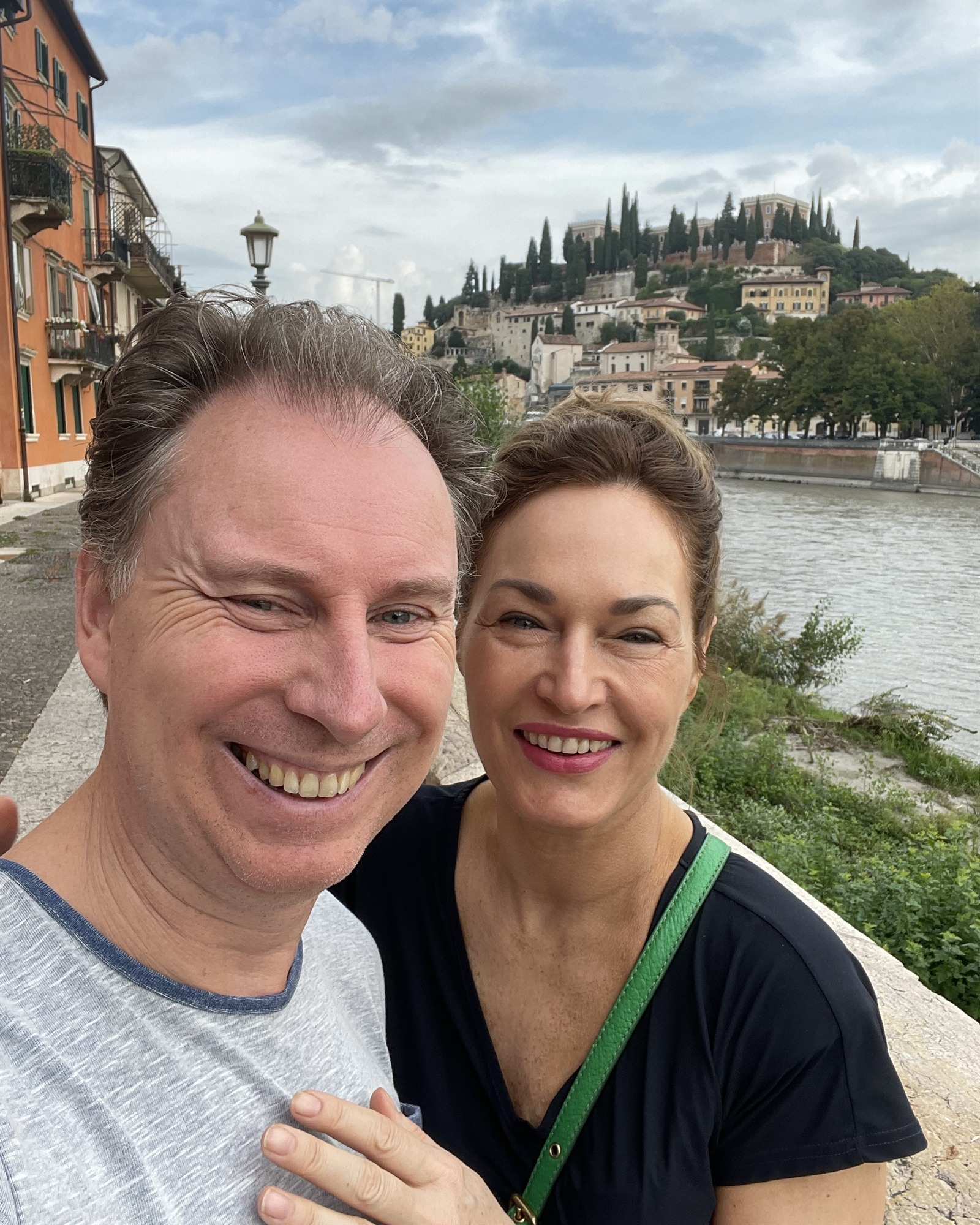 Hans and Karin together by the river in Verona