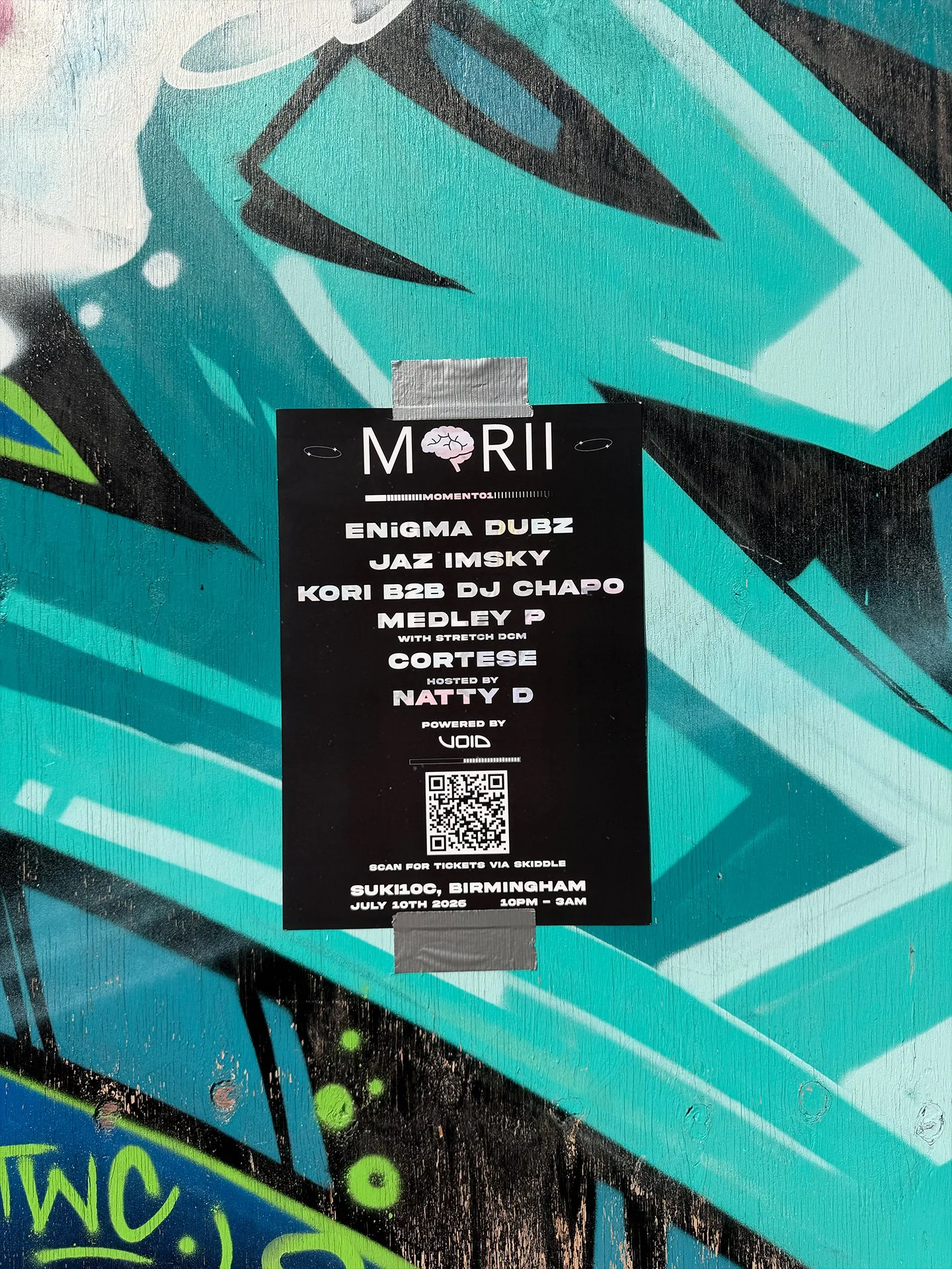 The printed poster for Morii Records' first event: Morii Moment 01 in Birmingham. This line up included ENiGMA Dubz, Jaz Imsky, Kori, DJ Chapo, Medley P, and Natty D. It was held at Suki10c on July 10th, 2026. Taken in Digbeth, Birmingham. 