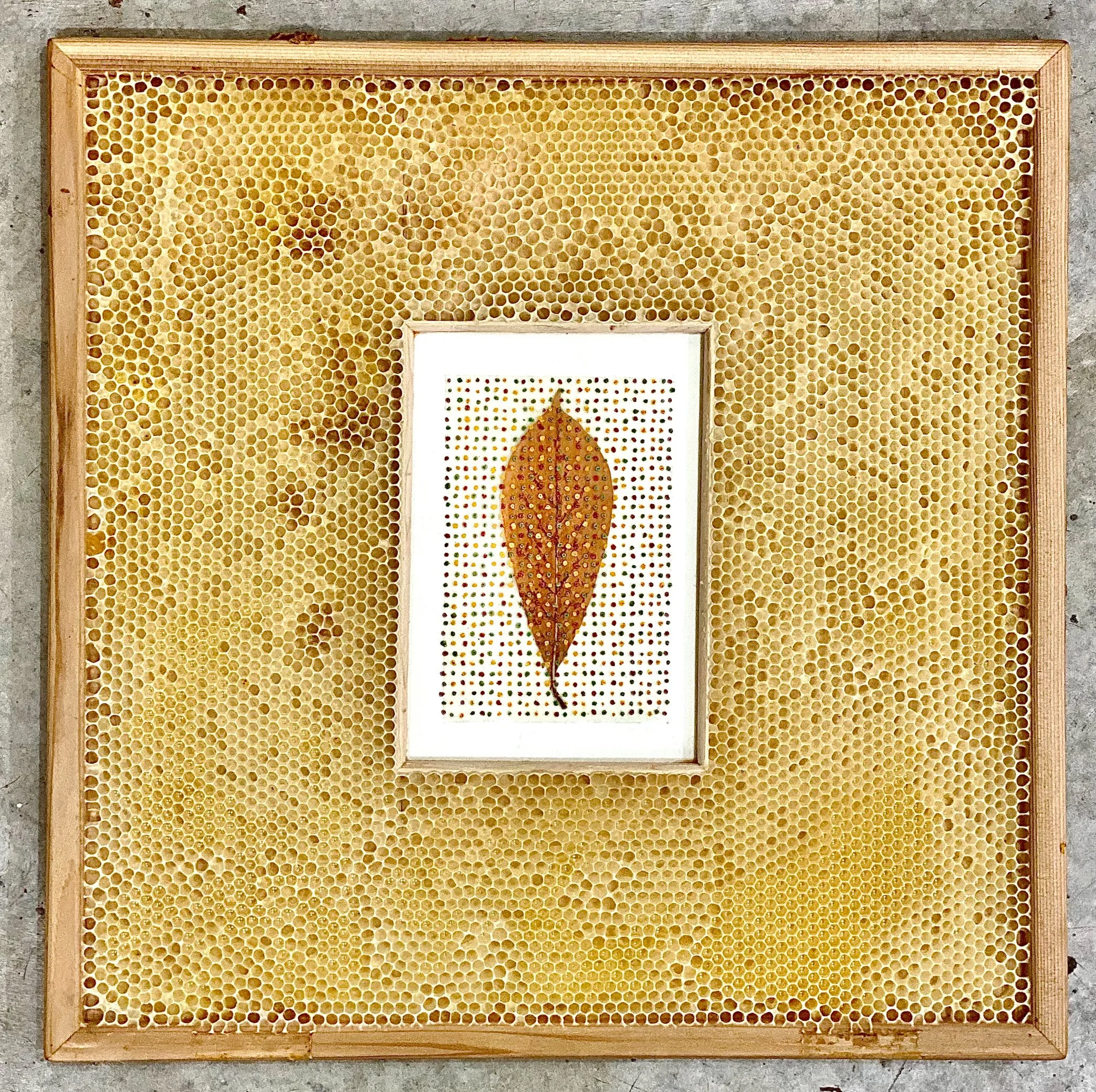  Honeycomb Collaboration: Magnolia Leaf with French Knots 
Japanese paper, encaustic, Magnolia leaf, embroidery floss, natural honeycomb on wood panel