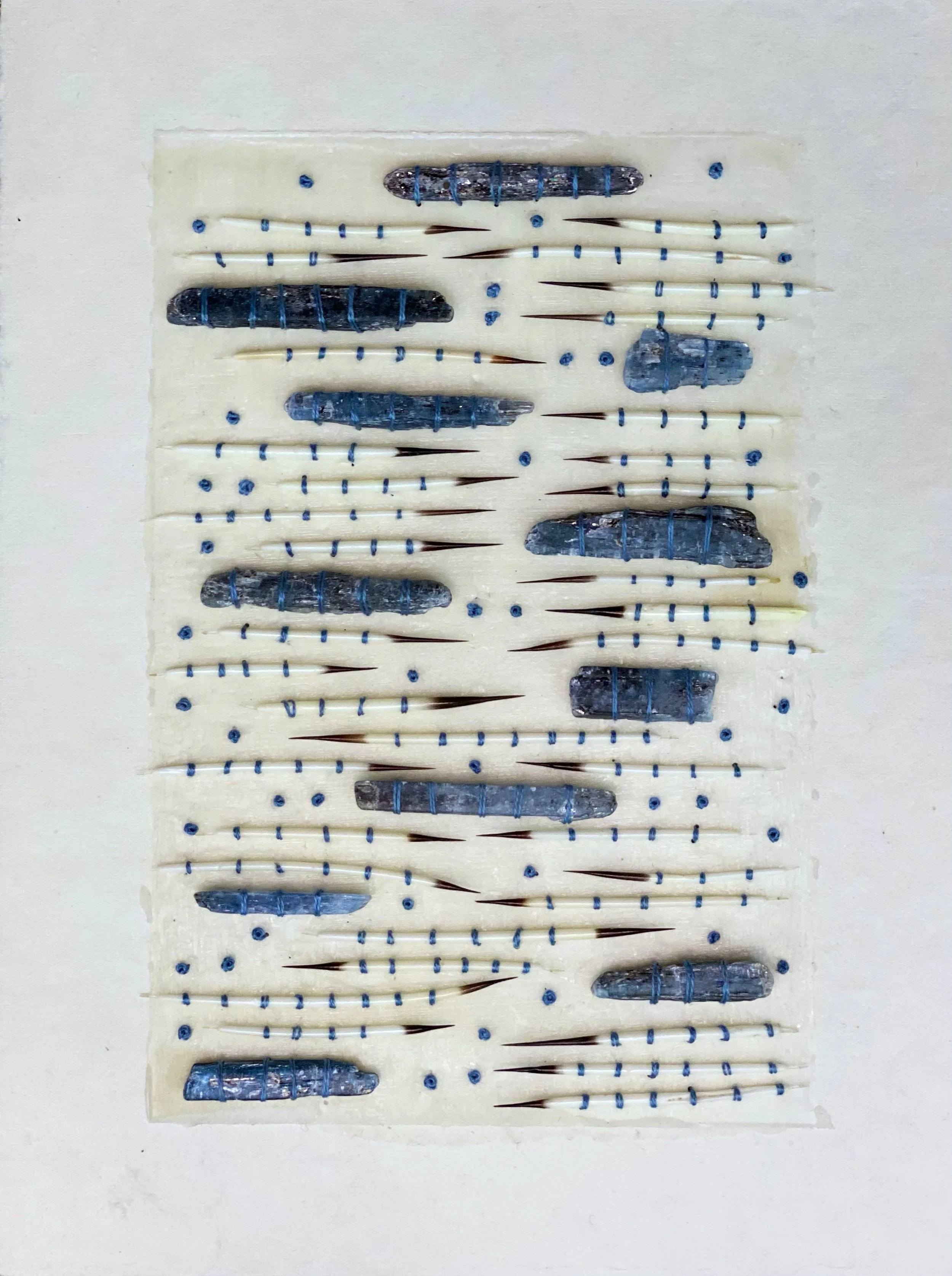  Blue Kyanite, Quills and French Knots on Paper 
Japanese paper, beeswax, Blue Kyanite crystals, porcupine quills and embroidery floss