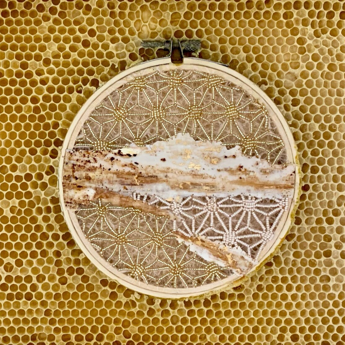  Honeycomb Collaboration: Gold and White with Birch Bark 
Japanese paper, encaustic, birch bark, gold leaf, oil paint, seeds beads, embroidery floss, embroidery hoop, natural honeycomb on wood panel
