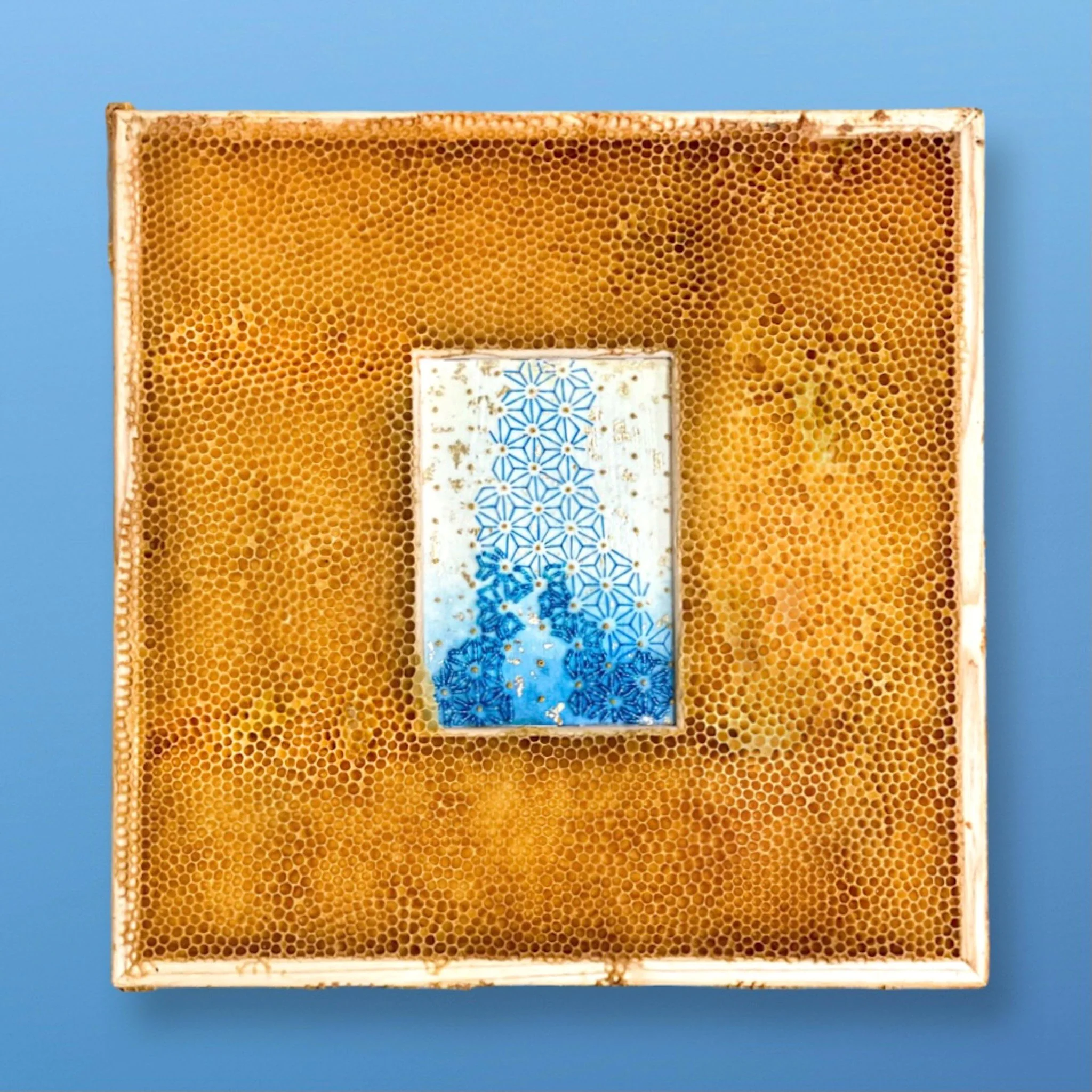  Honeycomb Collaboration: Blue Ombre 
Japanese paper, encaustic, gold leaf, seed beads, embroidery floss, natural honeycomb on wood panel