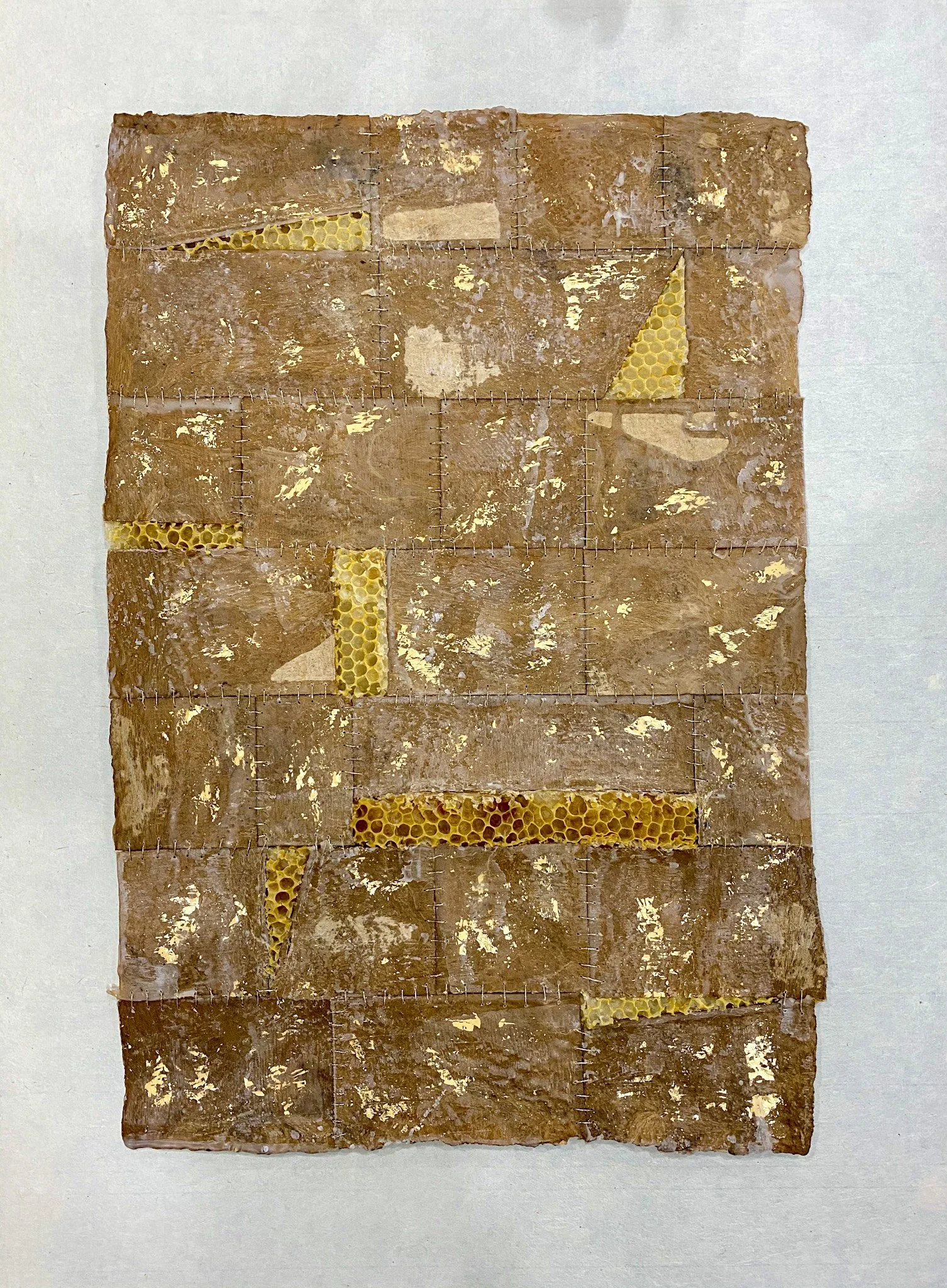  Organic Paper, Re-Assembeld with Comb 
Organic paper, beeswax, gold leaf, wire thread and natural honeycomb