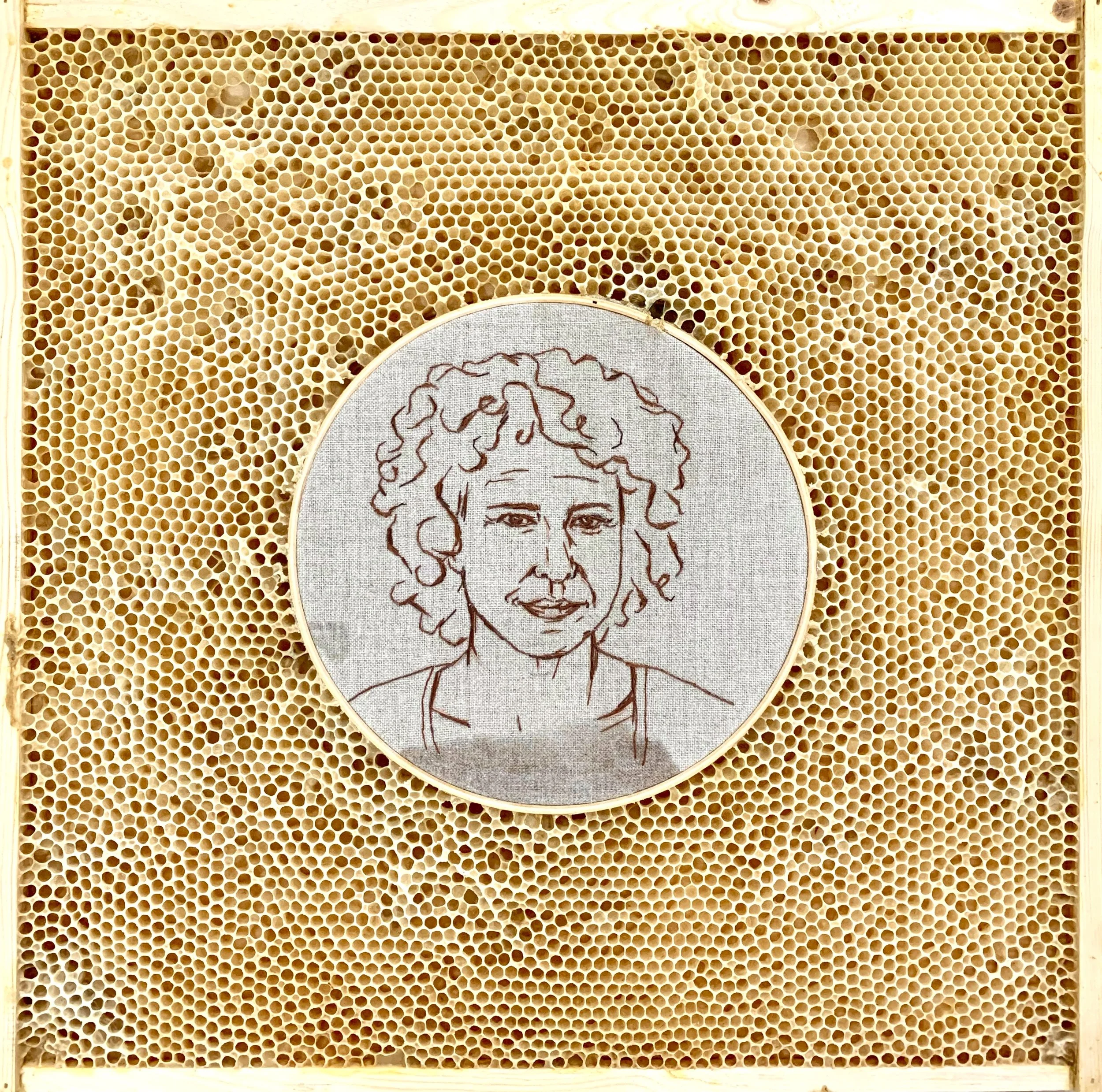  Honeycomb Collaboration: Self Portrait on Linen 
Japanese paper, linen, embroidery floss, embroidery hoop, natural honeycomb on wood panel
