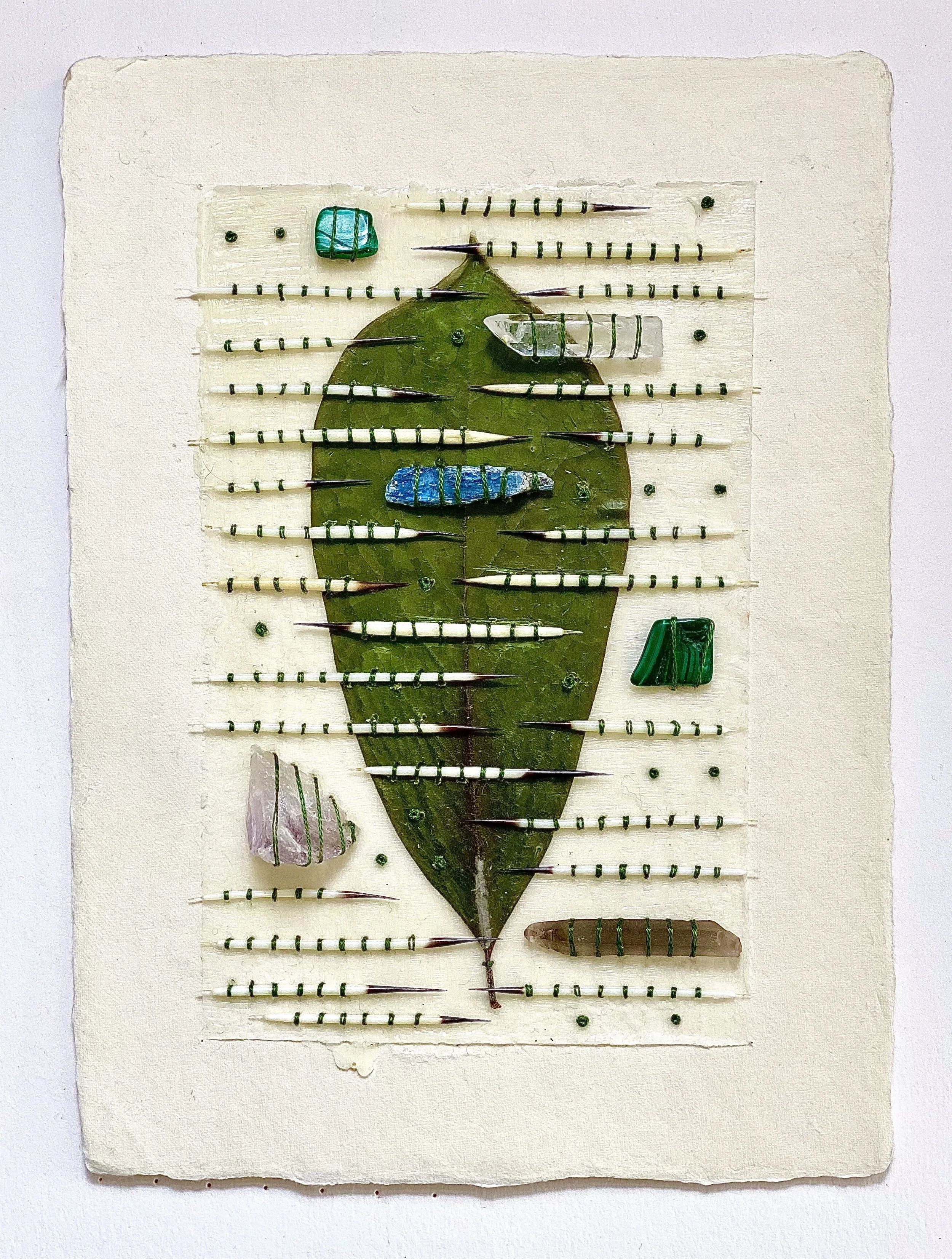  Tulip Leaf, Quills and Crystals on Paper 
Japanese paper, beeswax, Tulip leaf, porcupine quills, crystals and embroidery floss