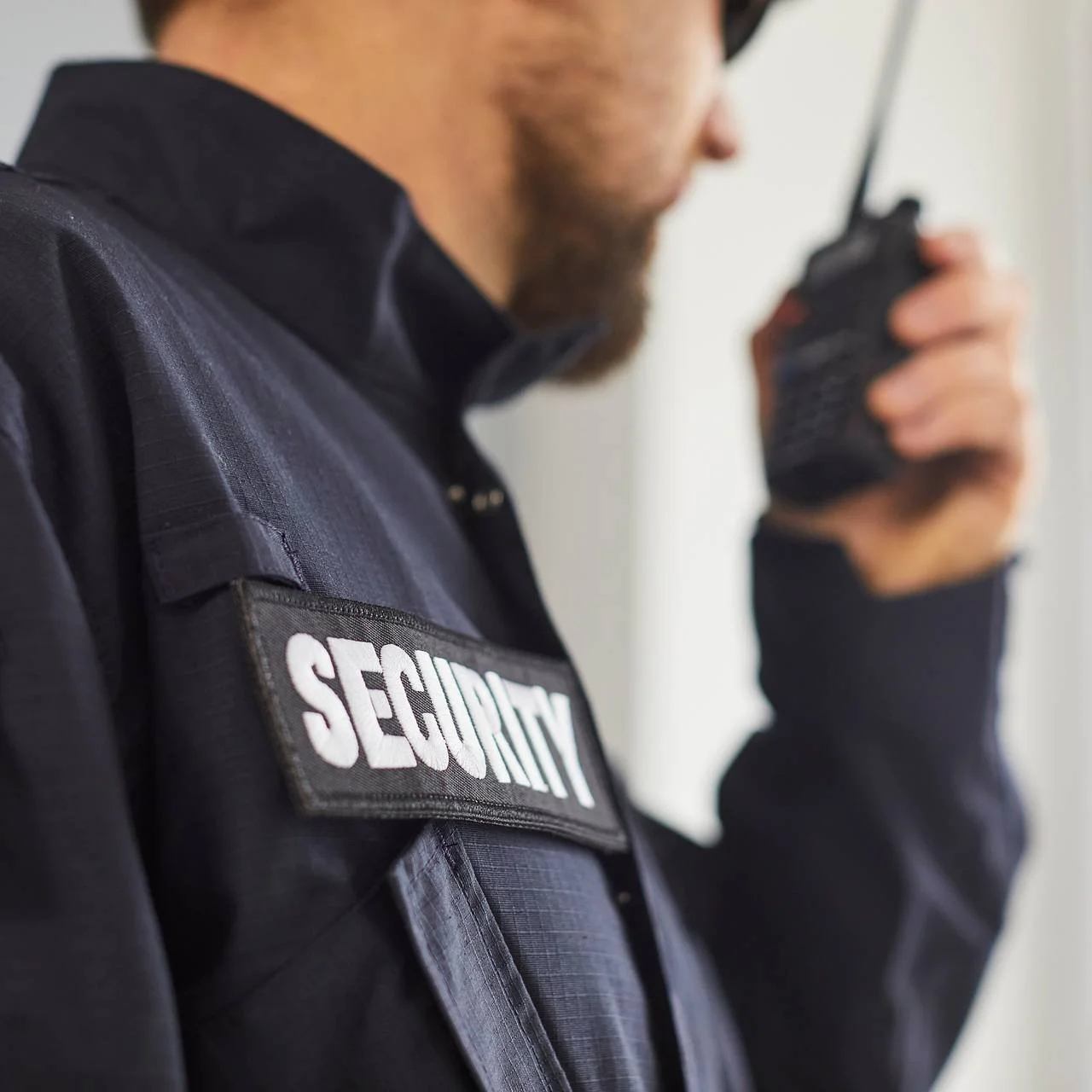 Security officer communicating by radio