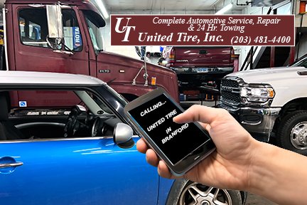 Calling United Tire - person holding cell phone