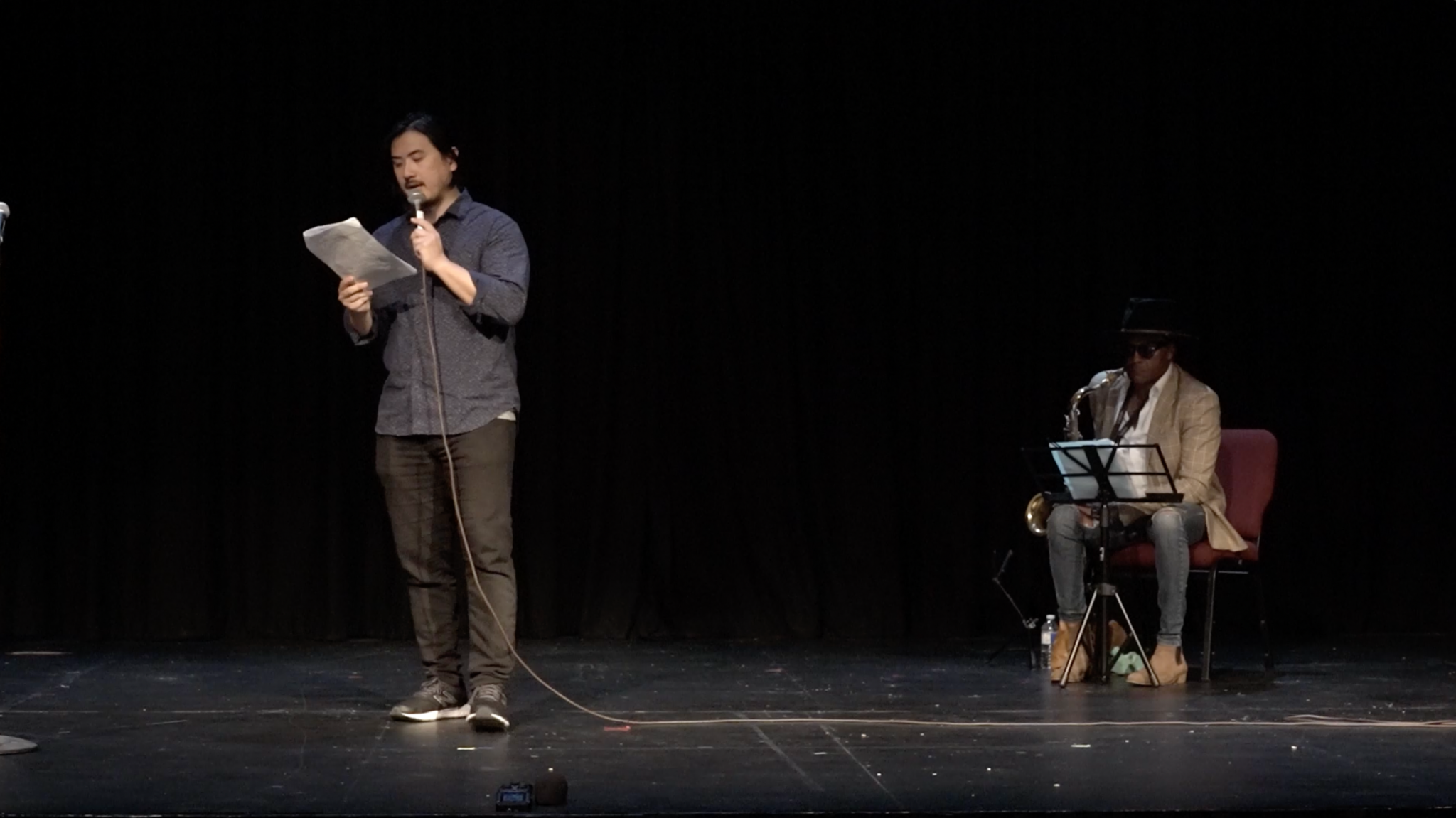 Adam Chen and Neil Braithwaite perform "Harmed in Hamilton" at the Players Guild Theatre