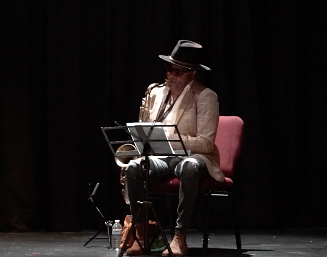Neil Braithwaite performs "Harmed in Hamilton" at the Players Guild Theatre