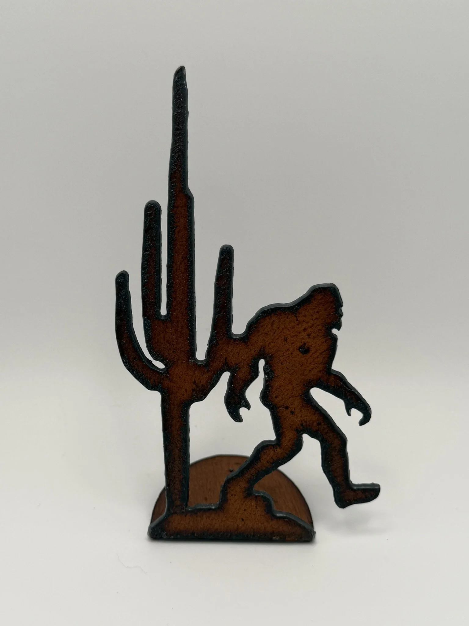 Locally Handcrafted Iron Art: Bigfoot and Saguaro