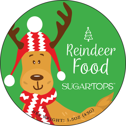 A circular logo with a cartoon reindeer wearing a red and white winter scarf and a red Christmas hat with a white pom-pom. The reindeer has antlers and a friendly face. To the right, there is a small Christmas tree and the text 'Reindeer Food' and 'SUGAR TOPS'. At the bottom, it states 'Net Weight: 1.5 oz (43 g)'. The background is green.