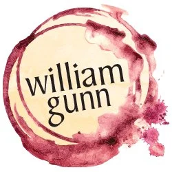A circular logo with a wine stain design, containing the text 'William Gunn' in the center.