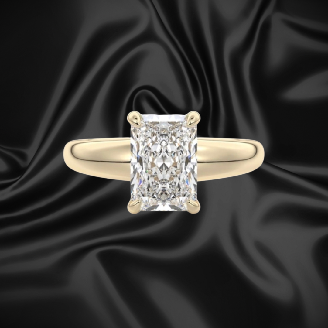 Round brilliant diamond engagement ring held in hand, showcasing the Engagement Ring Center at SINO Fine Jewelry in Boca Raton.