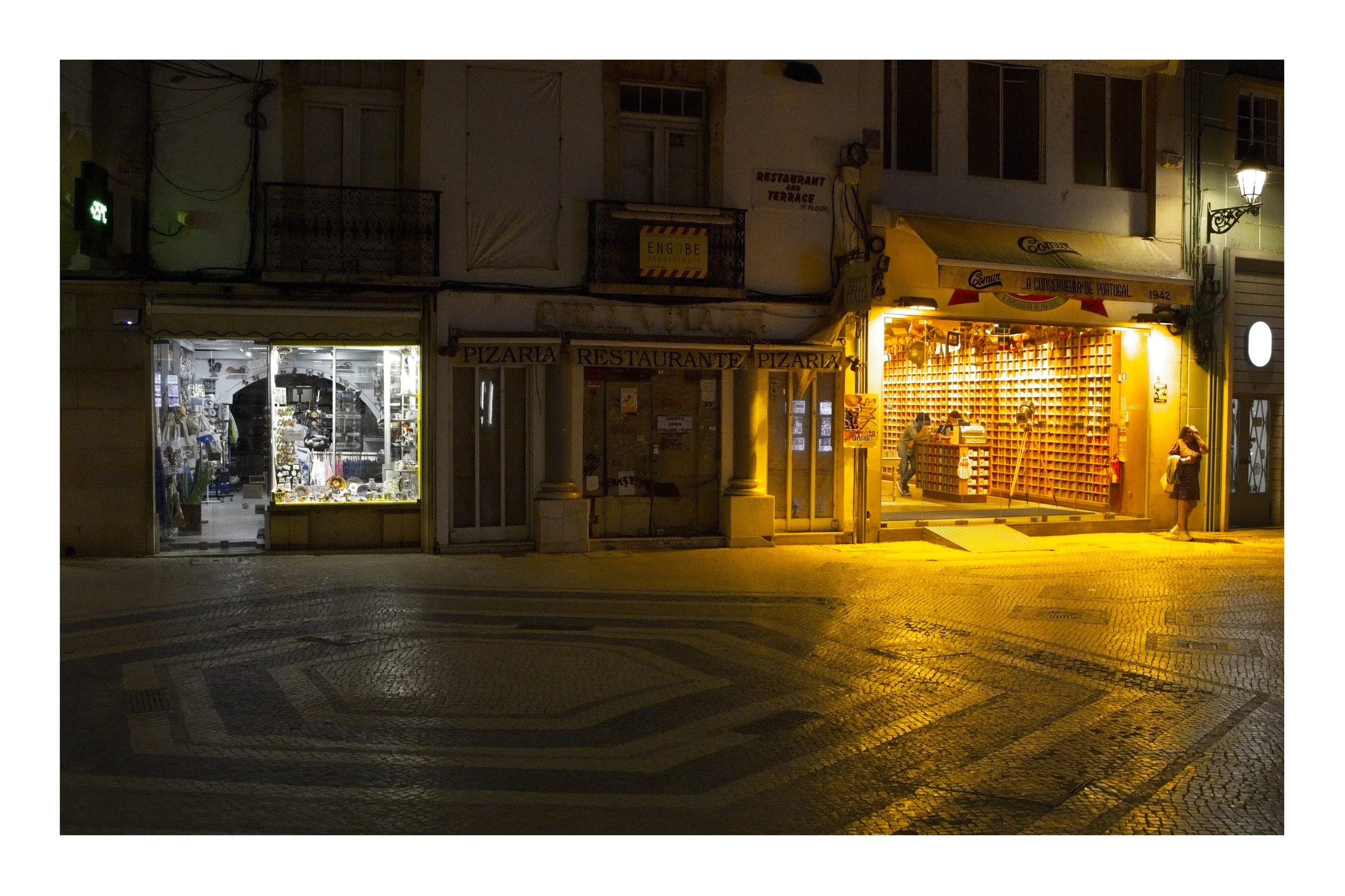 An illuminated shopfront in Faro, Portugal