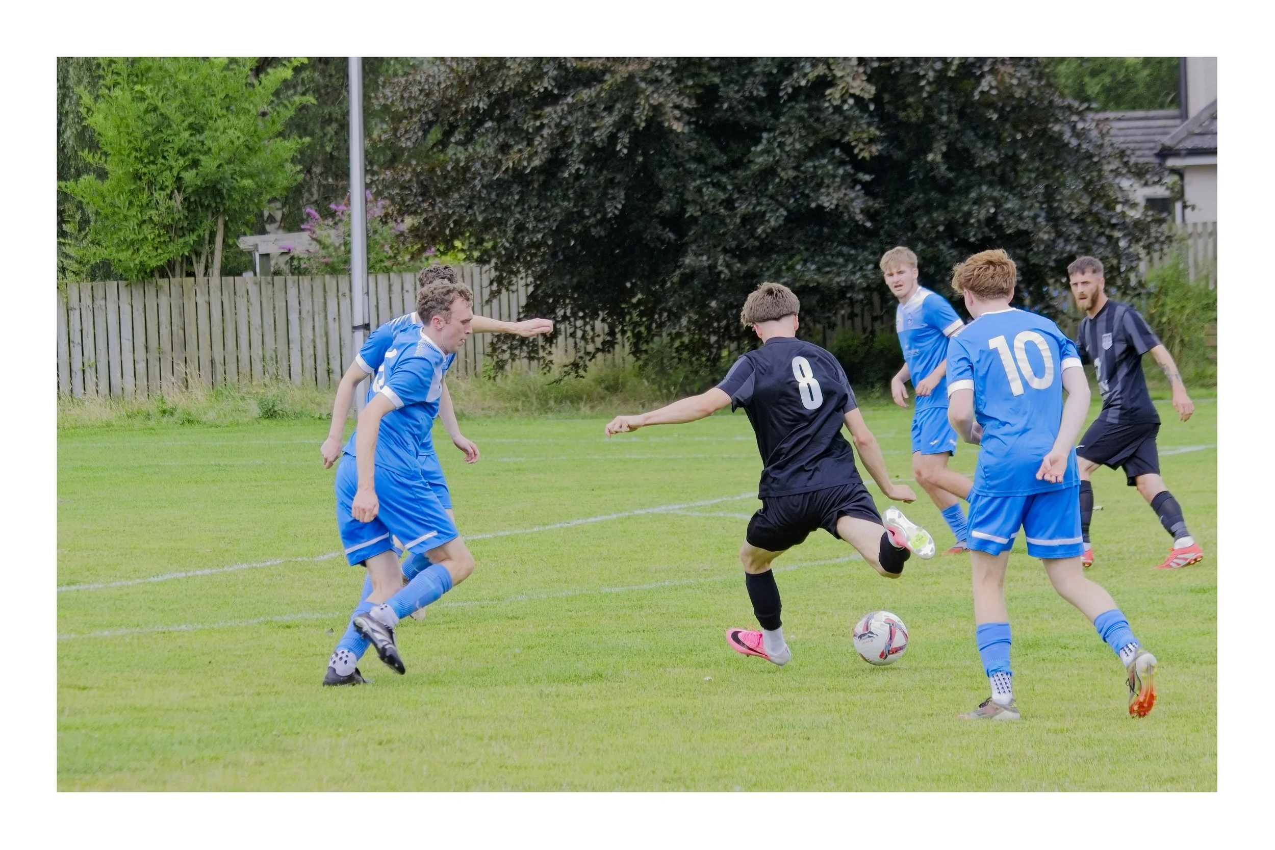 A footballer about to take a shot at goal