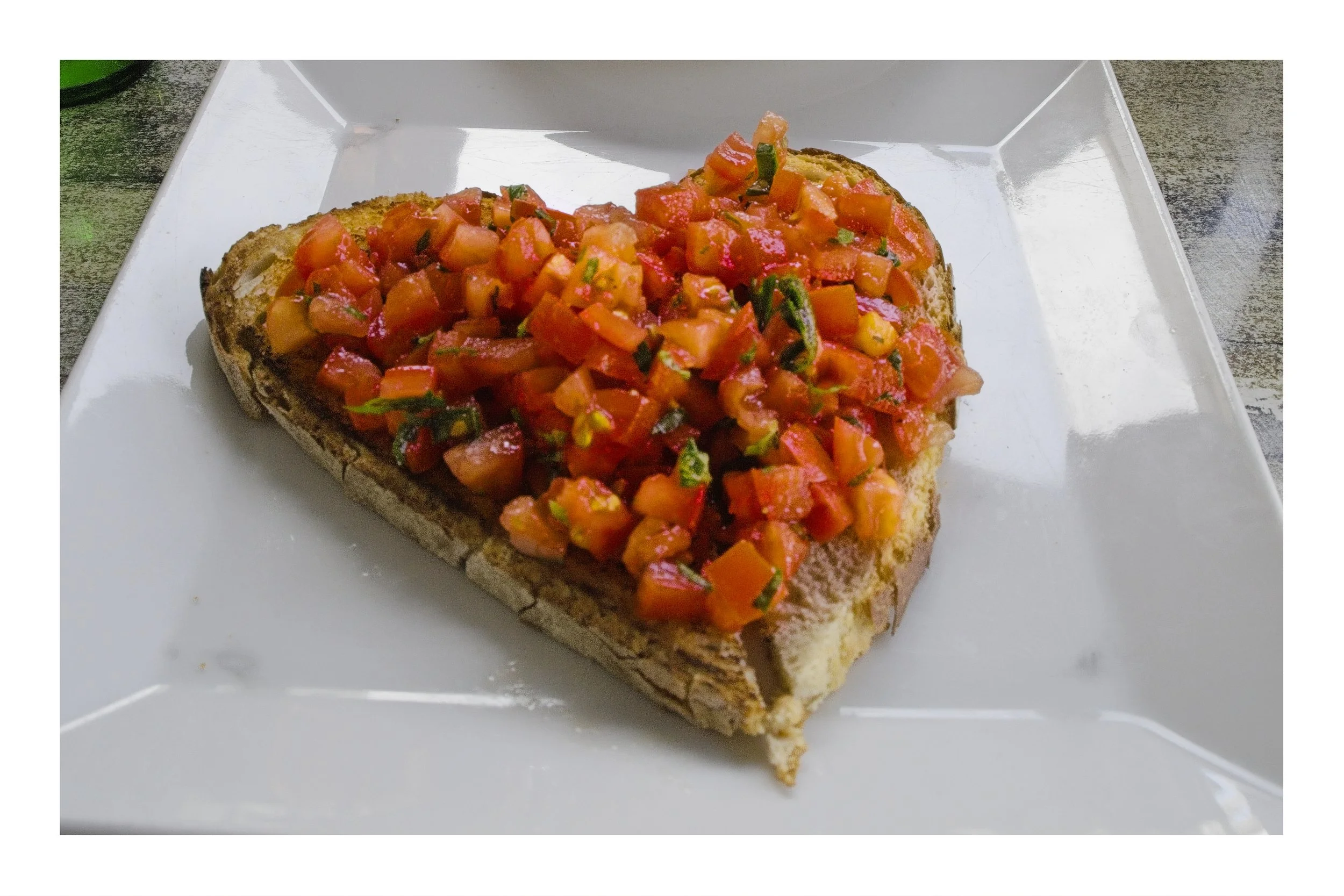 A heart shaped bruschetta