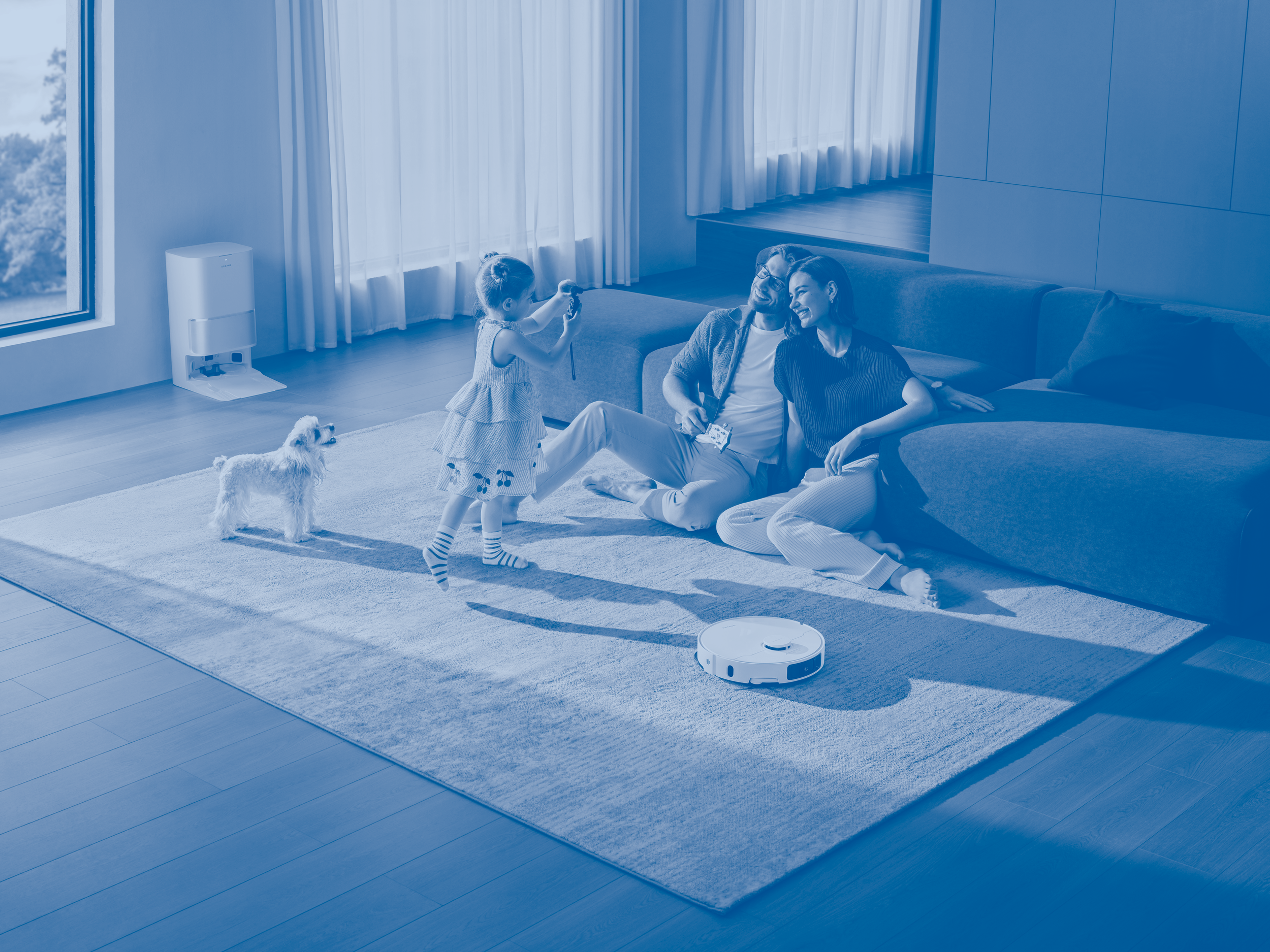 Family relaxing at home with their dog.