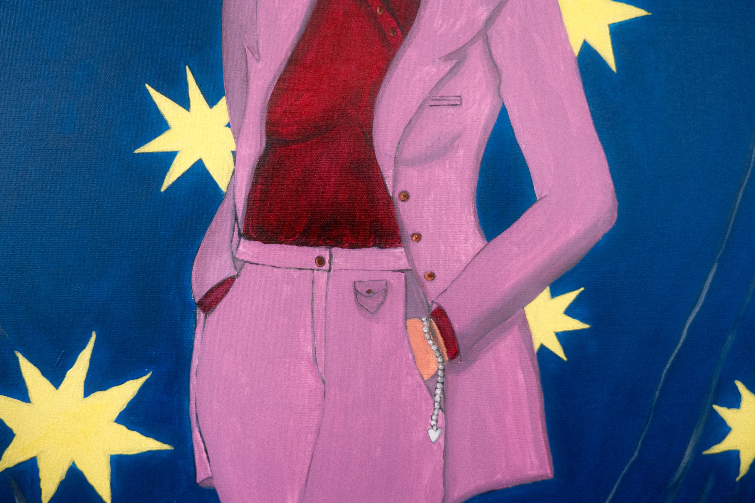 Detail of the painting Mother and her lucky charm. Close-up of a woman wearing a pink suit standing in front of a blue background with yellow stars.